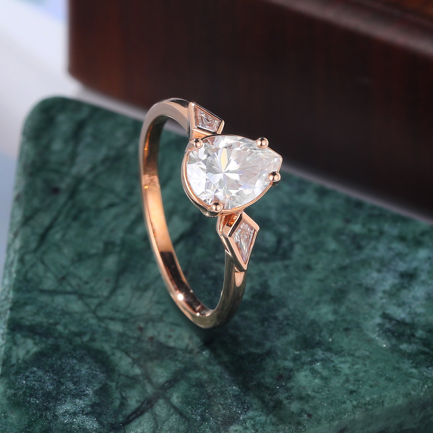 Pear shape moissanite rose gold engagement Ring.