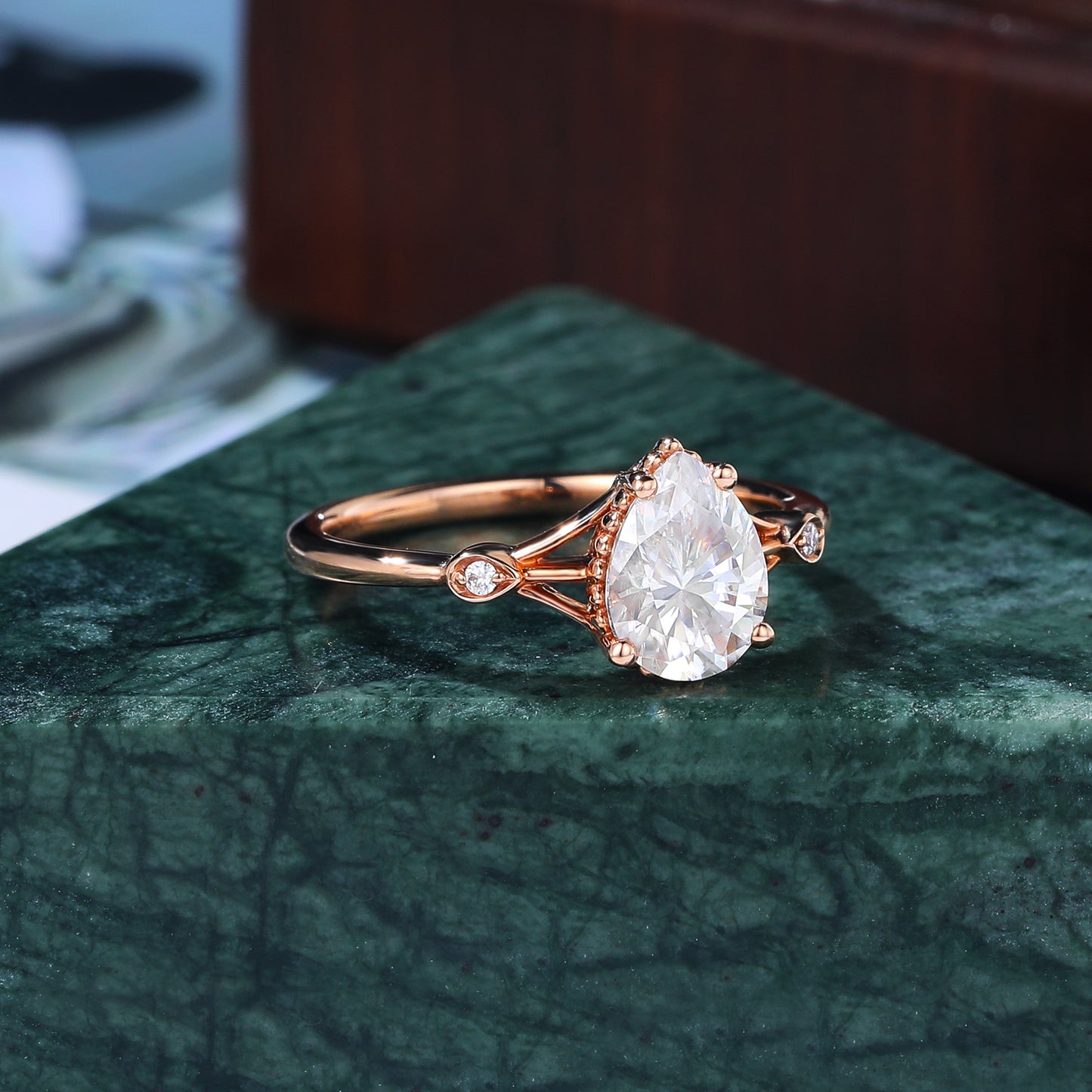Pear shape moissanite rose gold engagement Ring.
