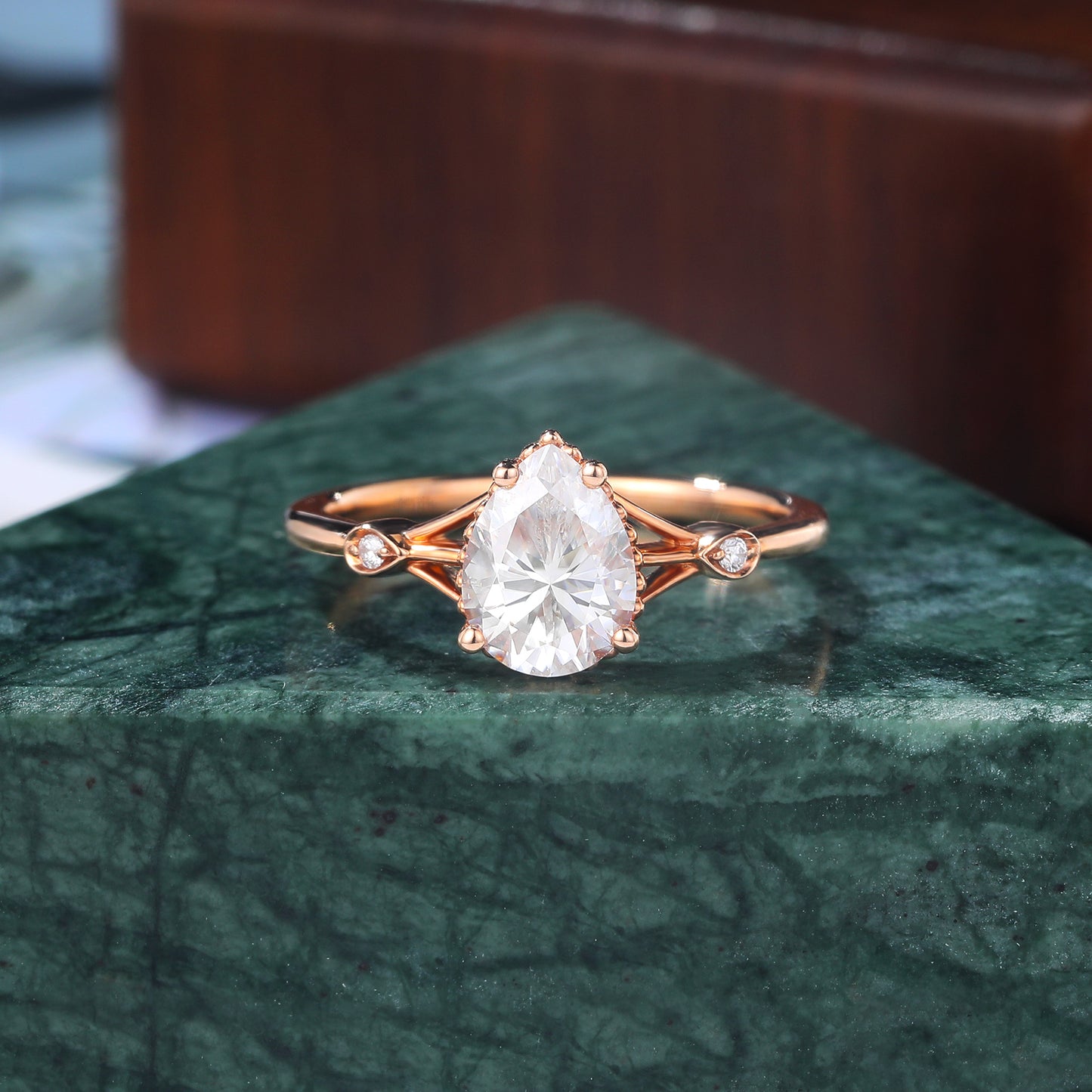 Pear shape moissanite rose gold engagement Ring.