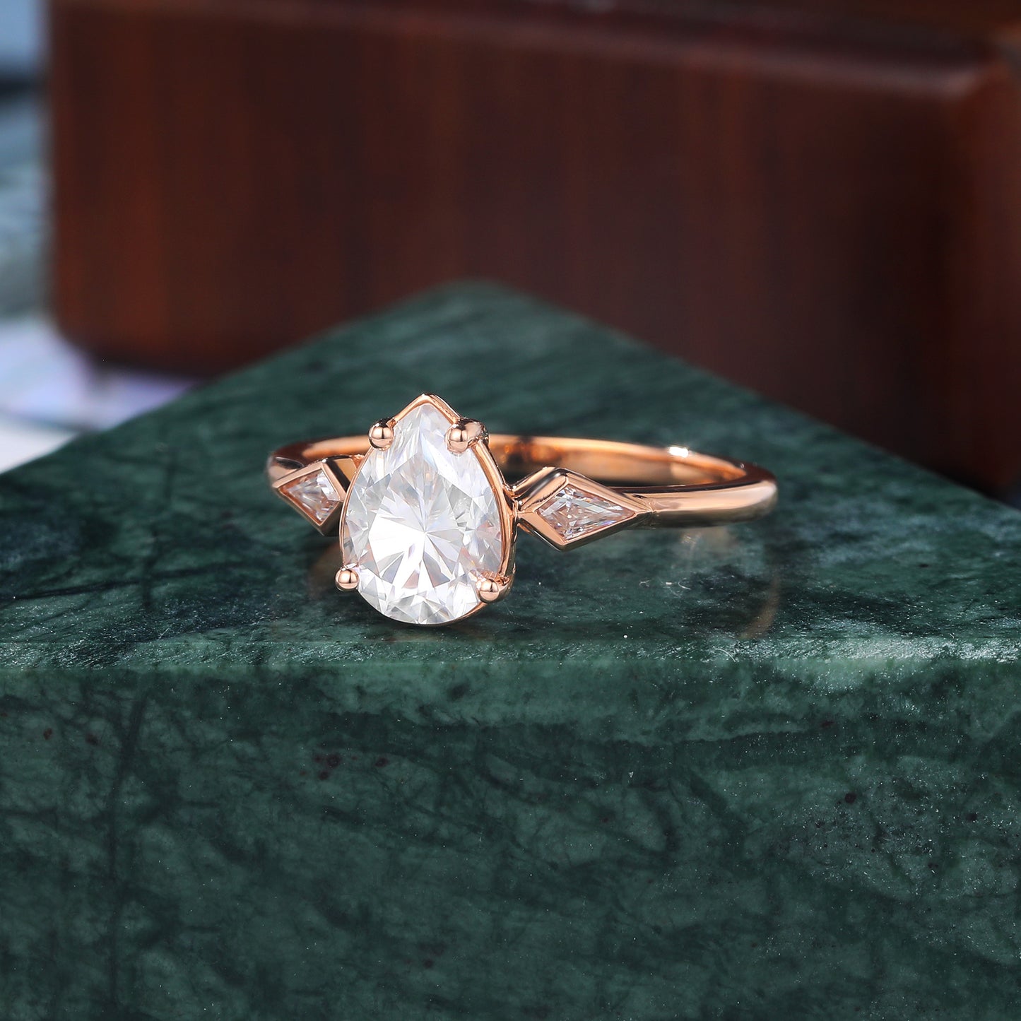 Pear shape moissanite rose gold engagement Ring.
