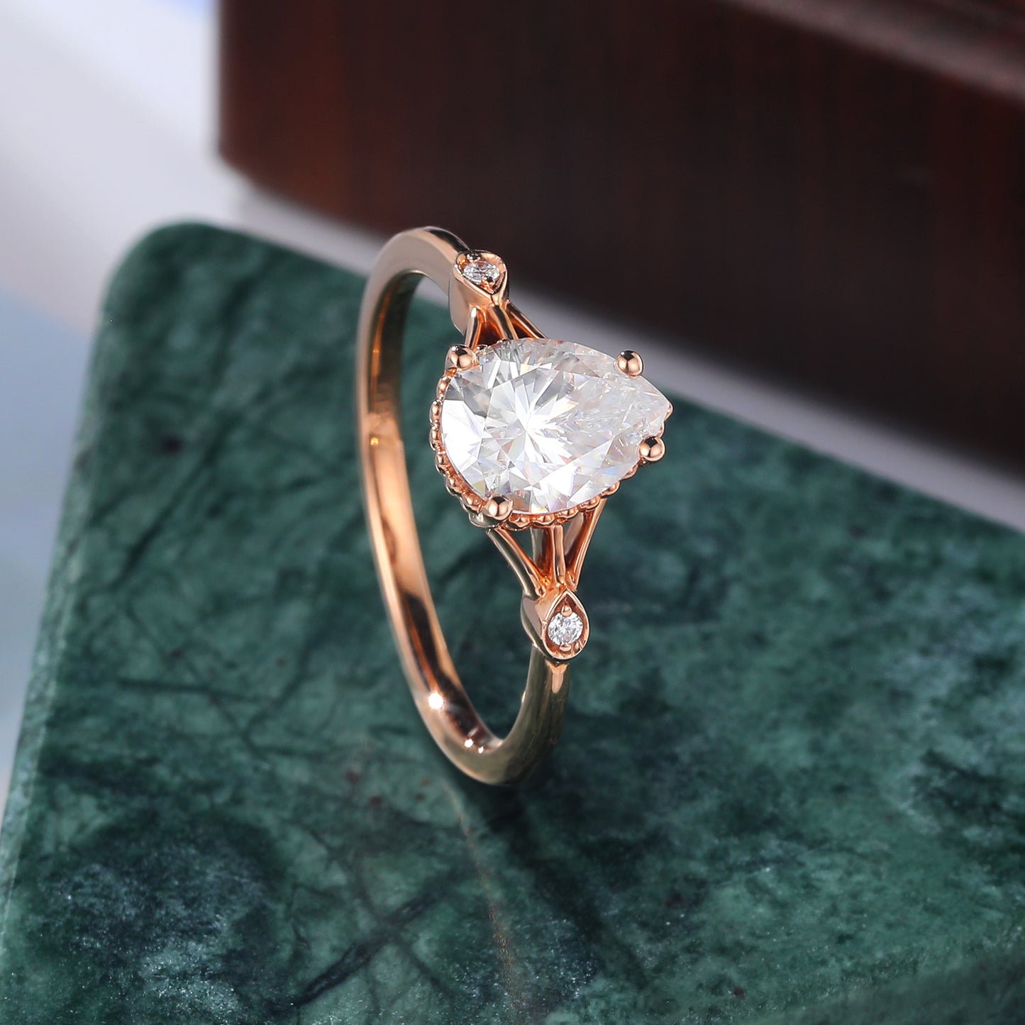 Pear shape moissanite rose gold engagement Ring.