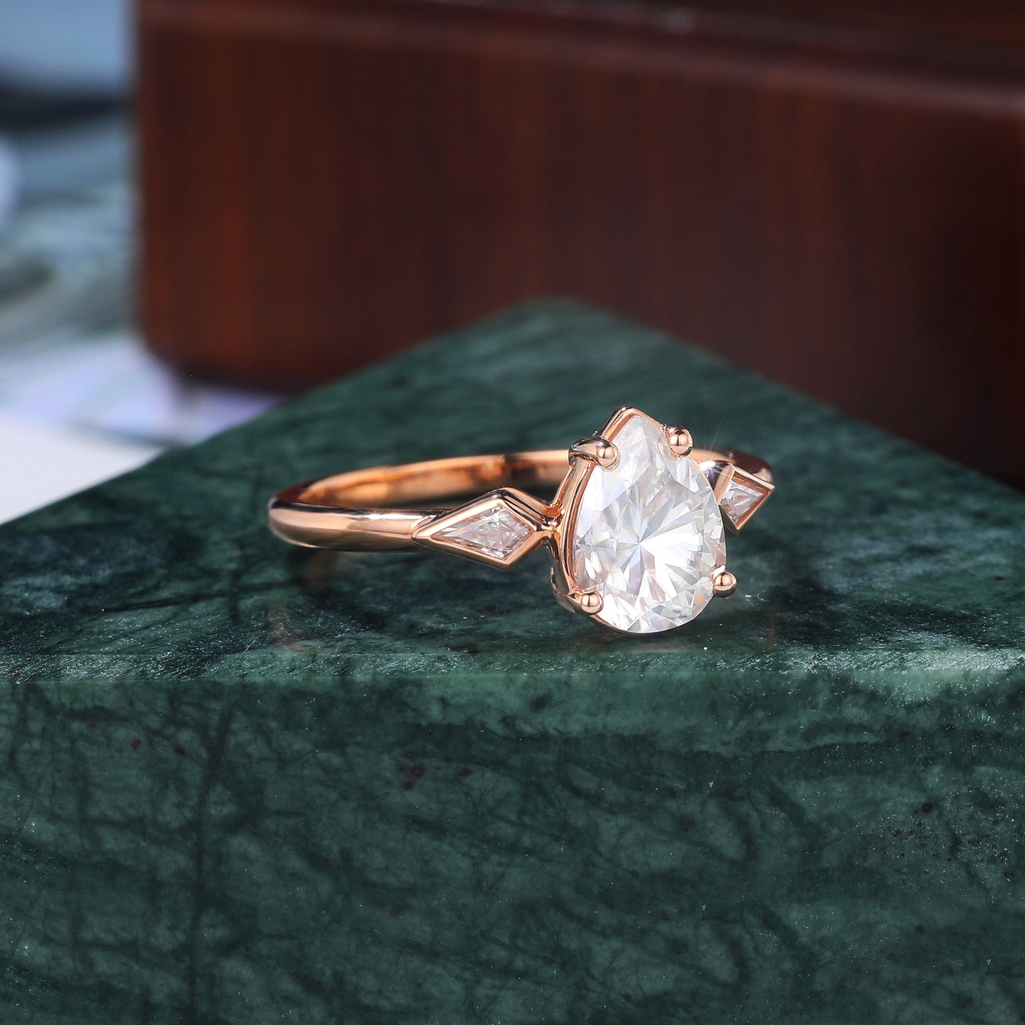 Pear shape moissanite rose gold engagement Ring.