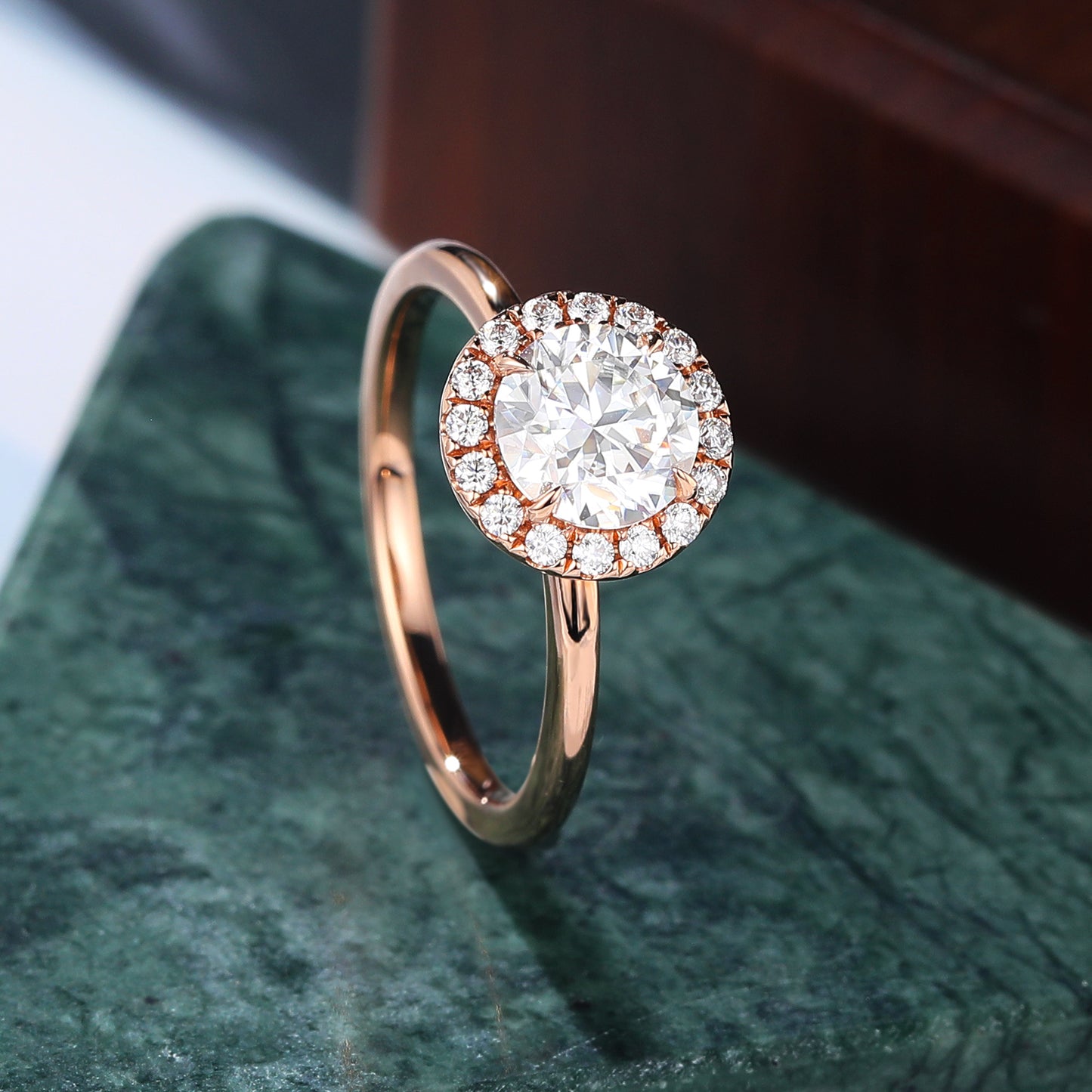Round cut Moissanite rose gold engagement Ring.