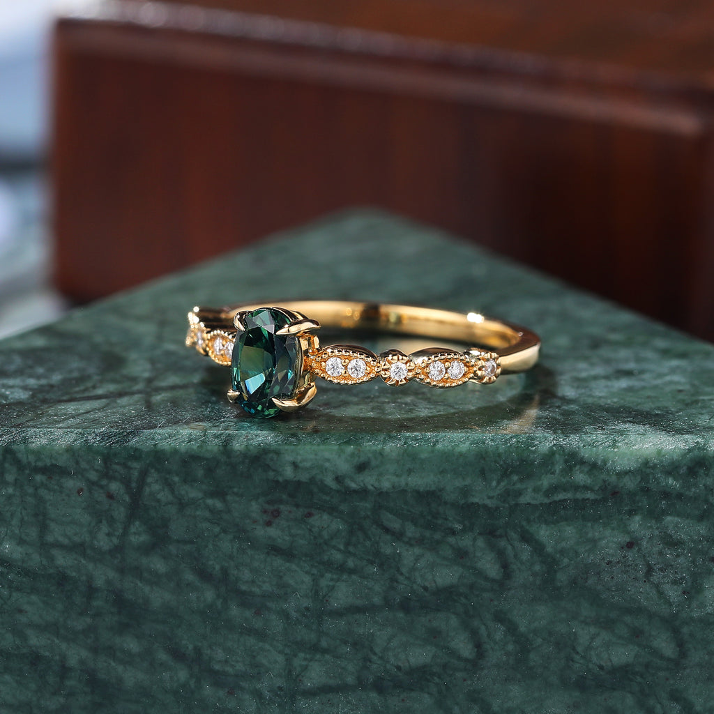 Oval cut Green Blue Sapphire yellow gold engagement Ring.