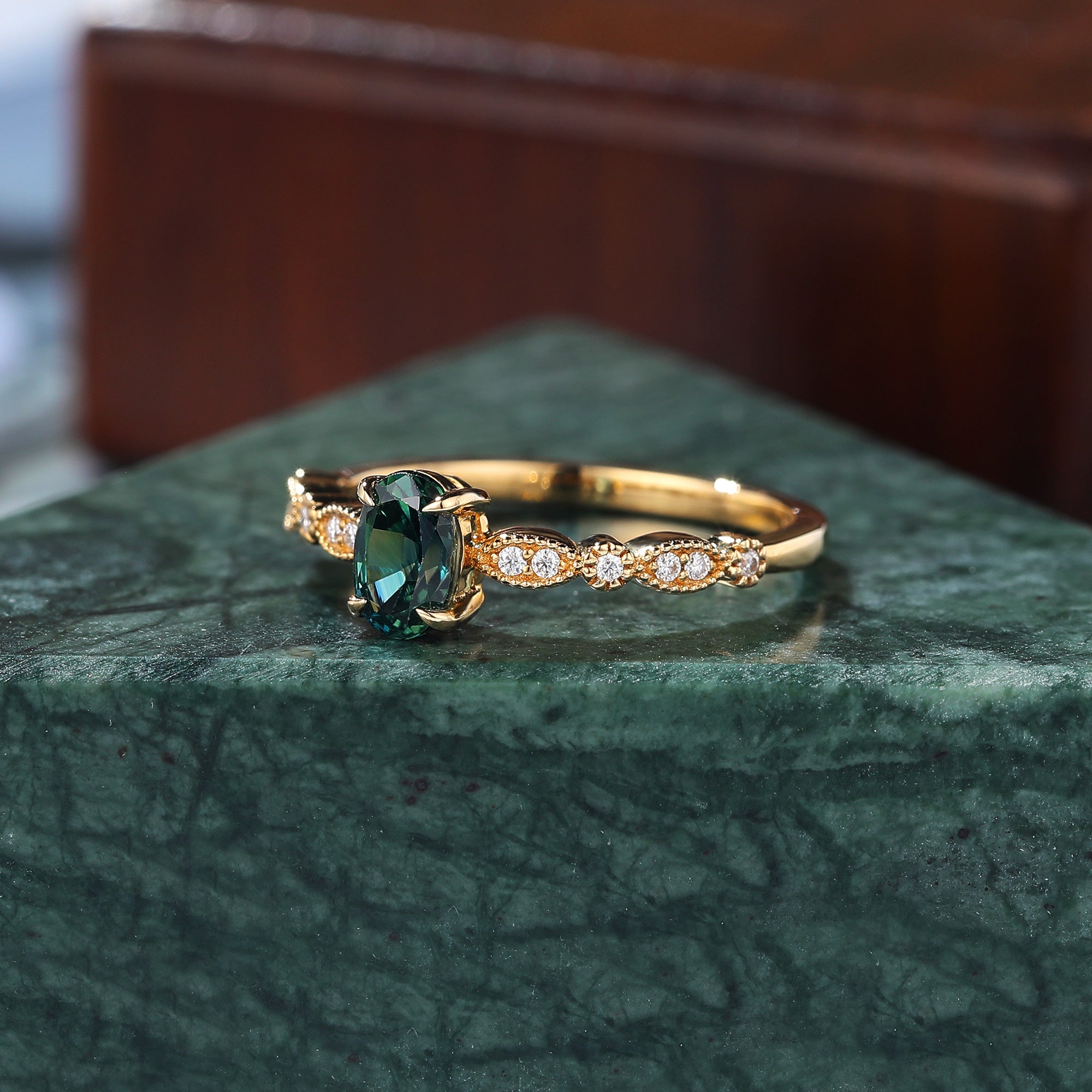 Oval cut Green Blue Sapphire yellow gold engagement Ring.