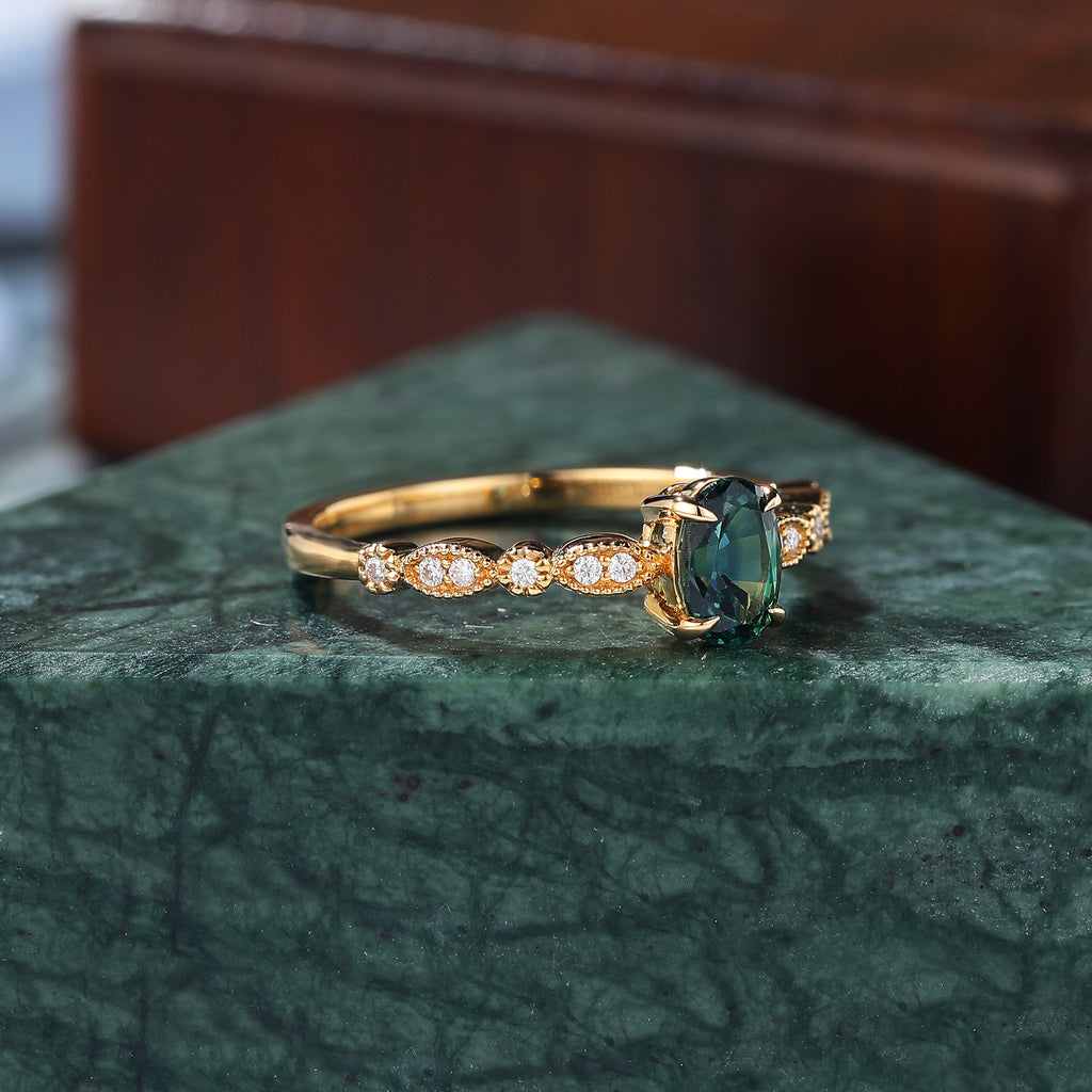 Oval cut Green Blue Sapphire yellow gold engagement Ring.
