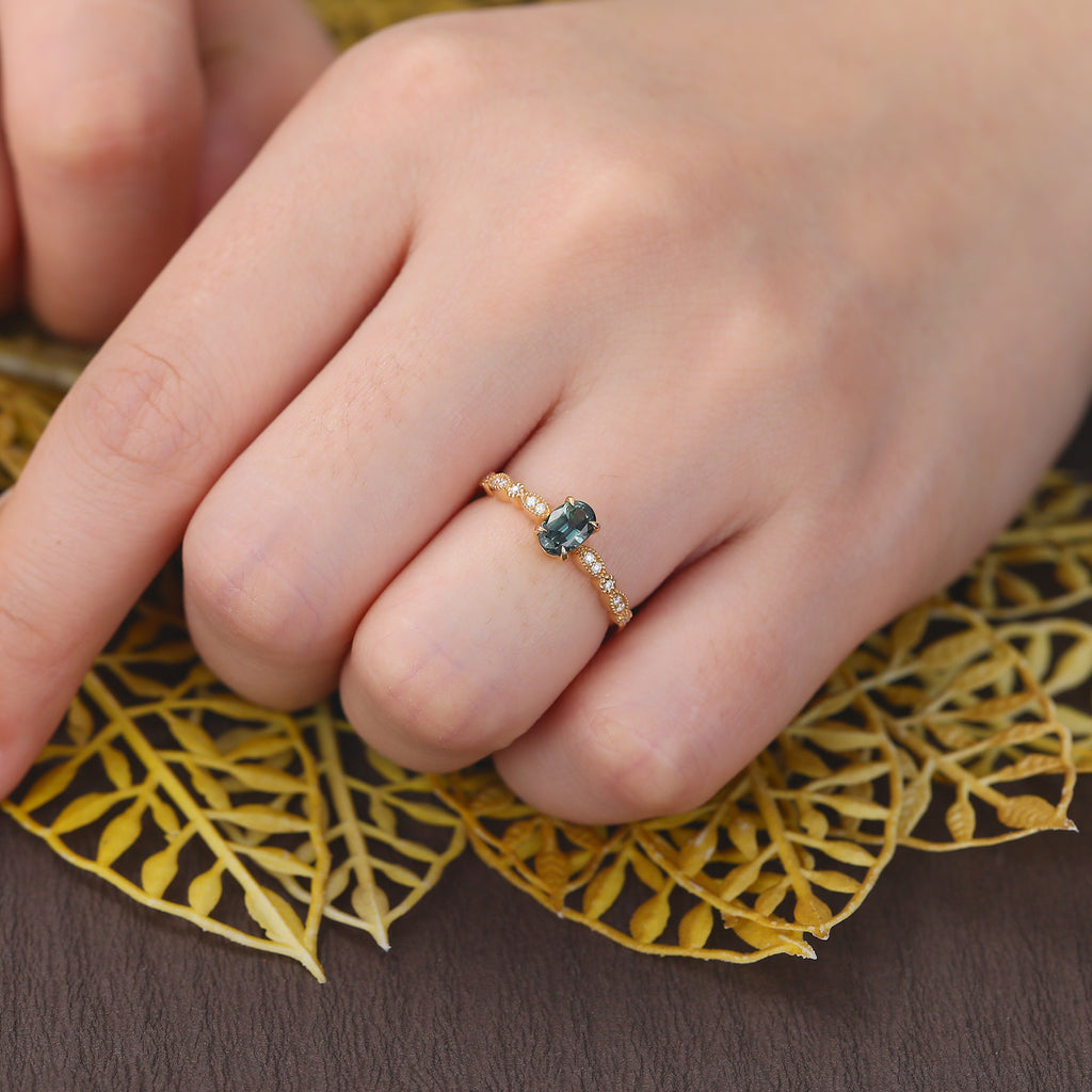 Oval cut Green Blue Sapphire yellow gold engagement Ring.