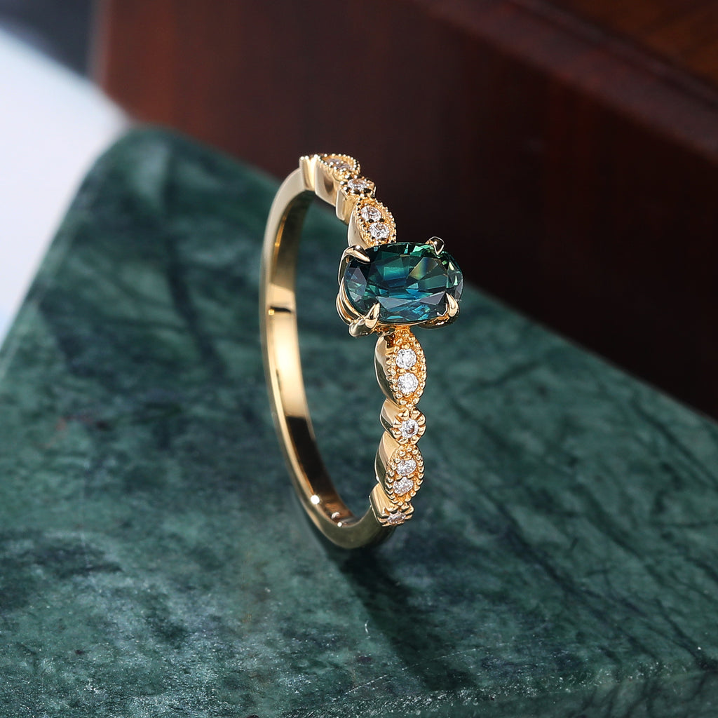 Oval cut Green Blue Sapphire yellow gold engagement Ring.