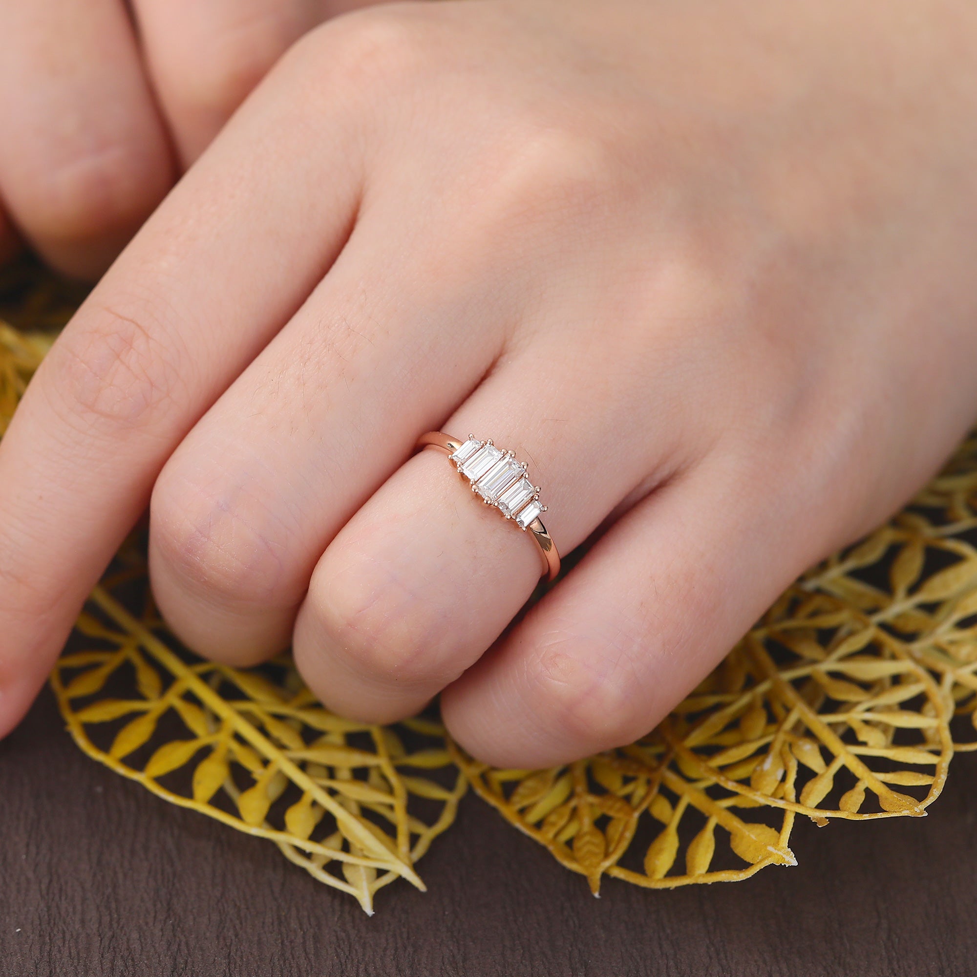 Baguette cut Moissanite rose gold engagement Ring.