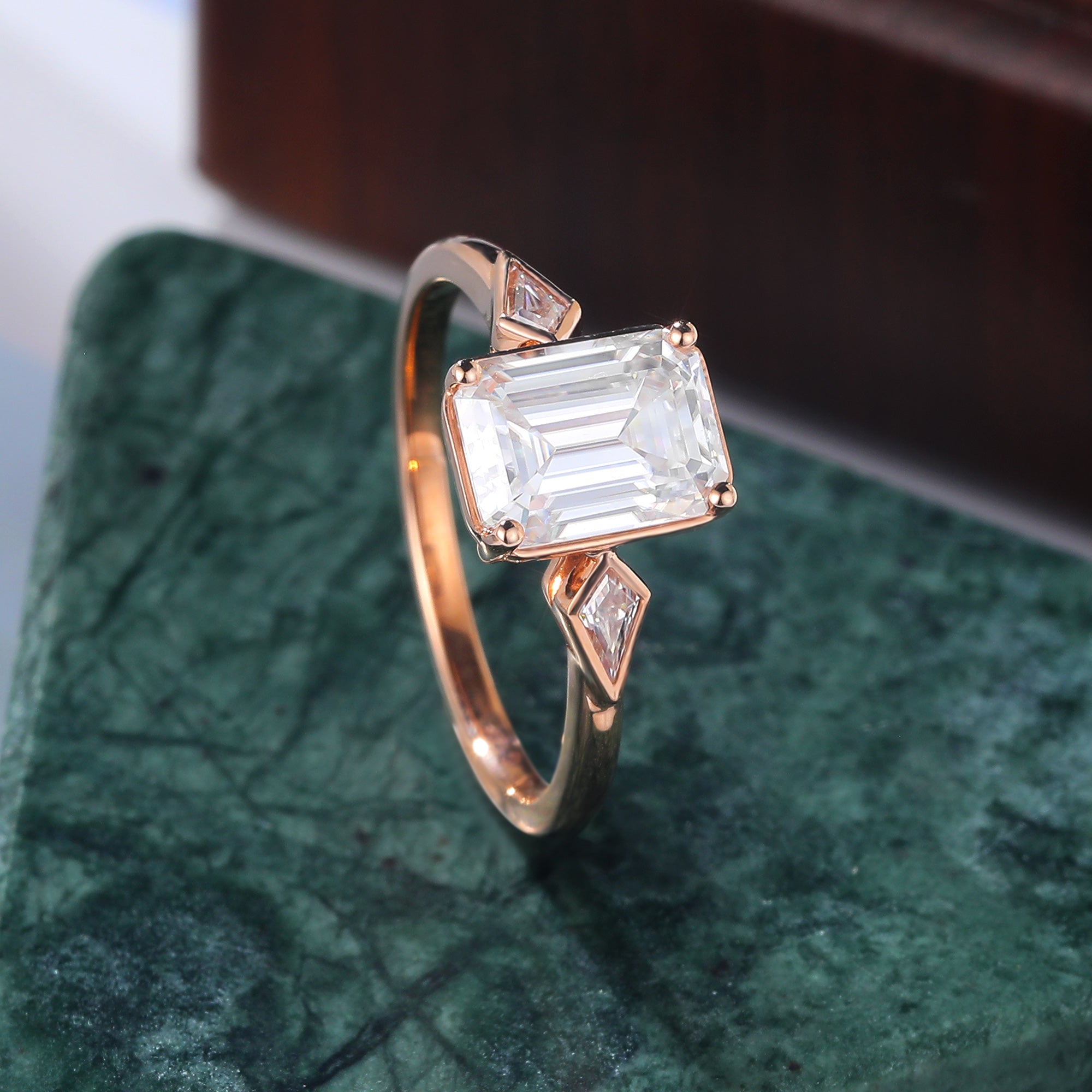 Emerald cut moissanite rose gold engagement Ring.