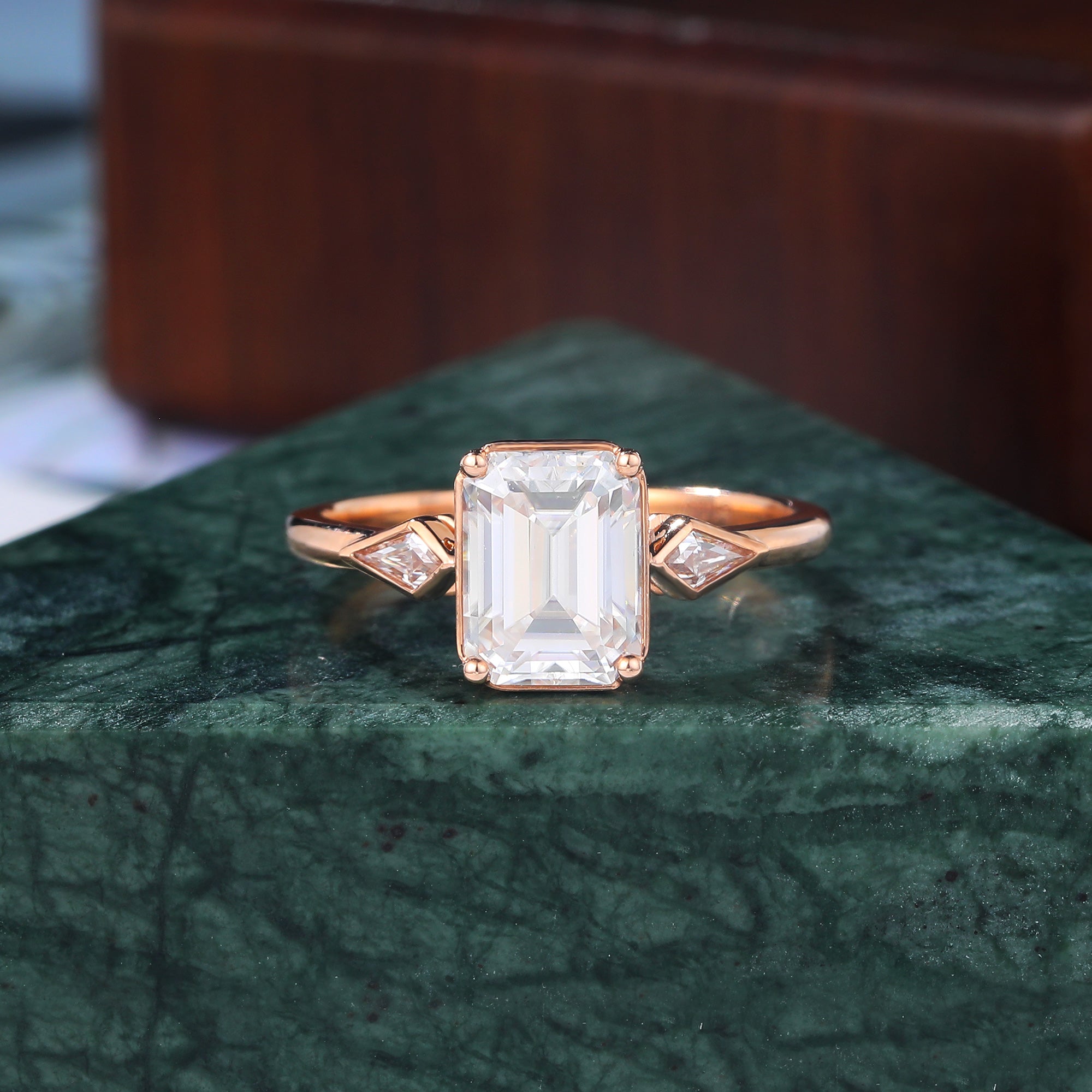 Emerald cut moissanite rose gold engagement Ring.