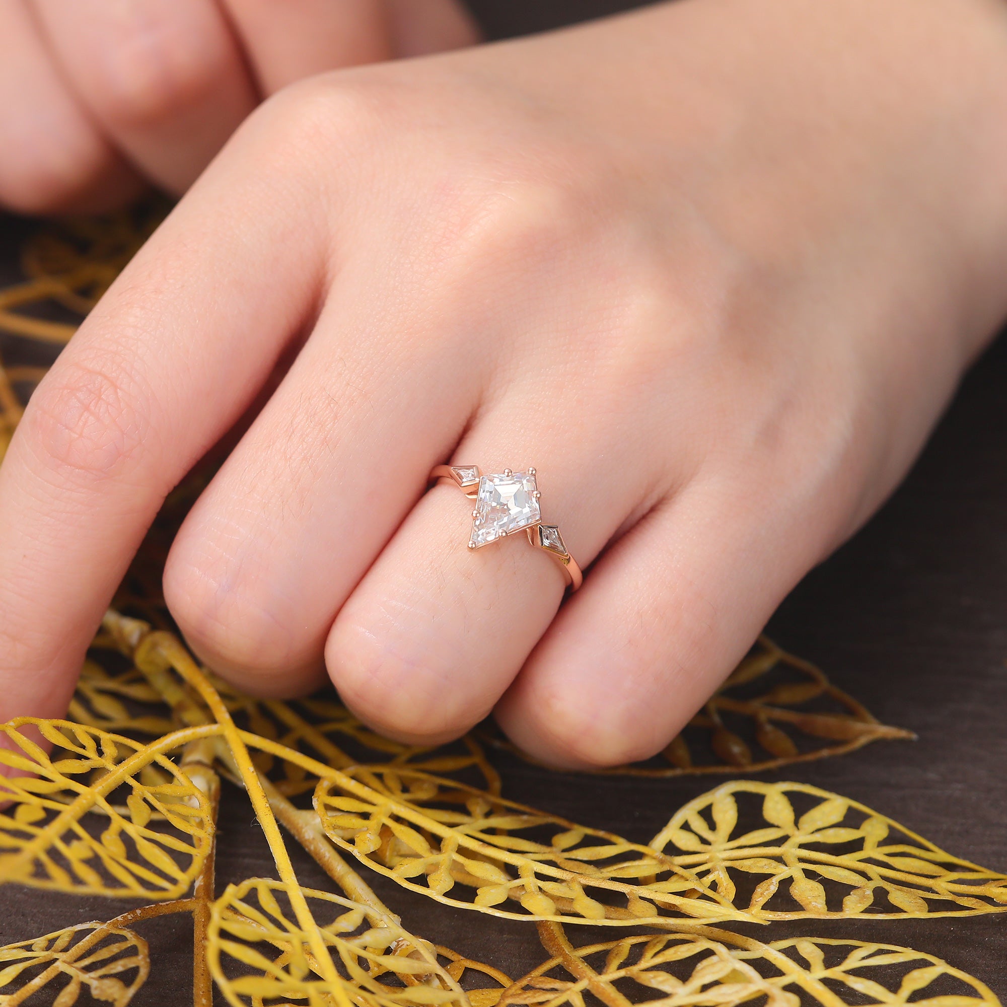 Kite cut moissanite rose gold engagement Ring.