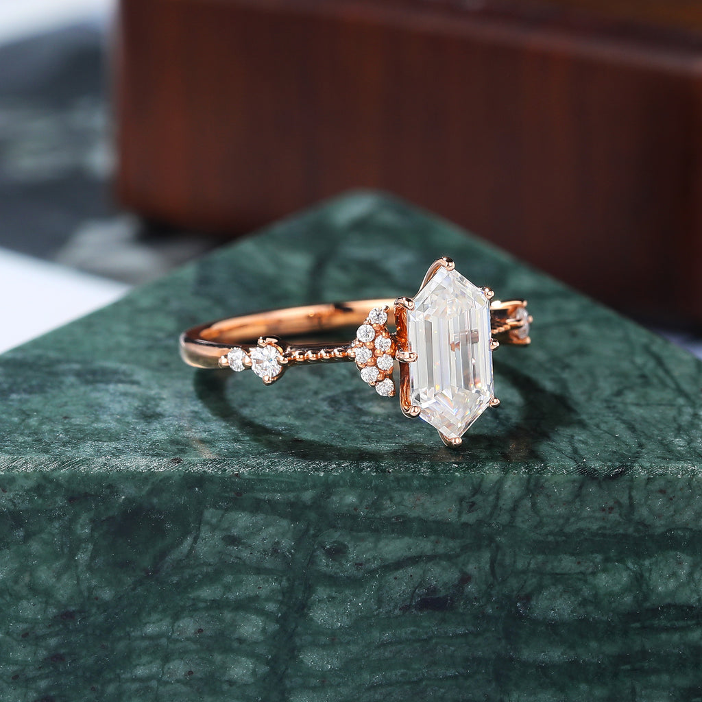 Long Hexagon cut moissanite rose gold engagement Ring.