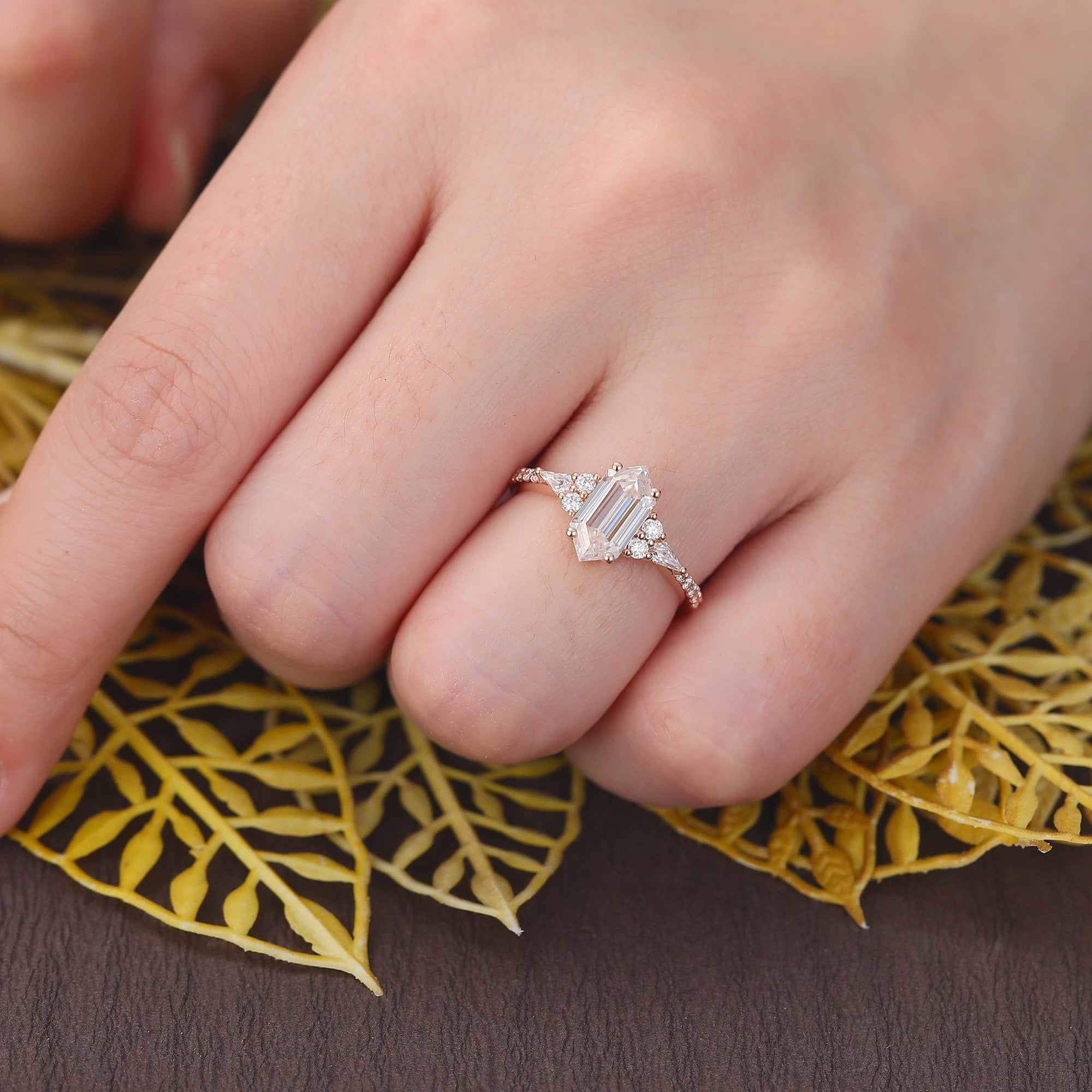 Long Hexagon cut moissanite rose gold engagement Ring.