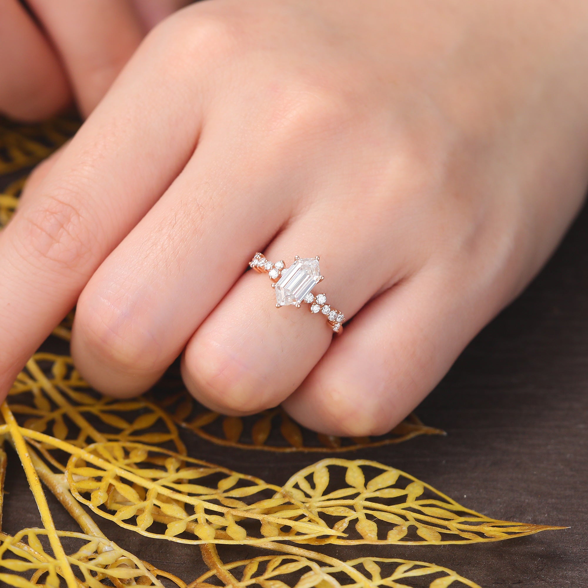 Long Hexagon cut moissanite rose gold engagement Ring.