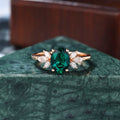 Oval cut Lab Emerald rose gold engagement Ring.