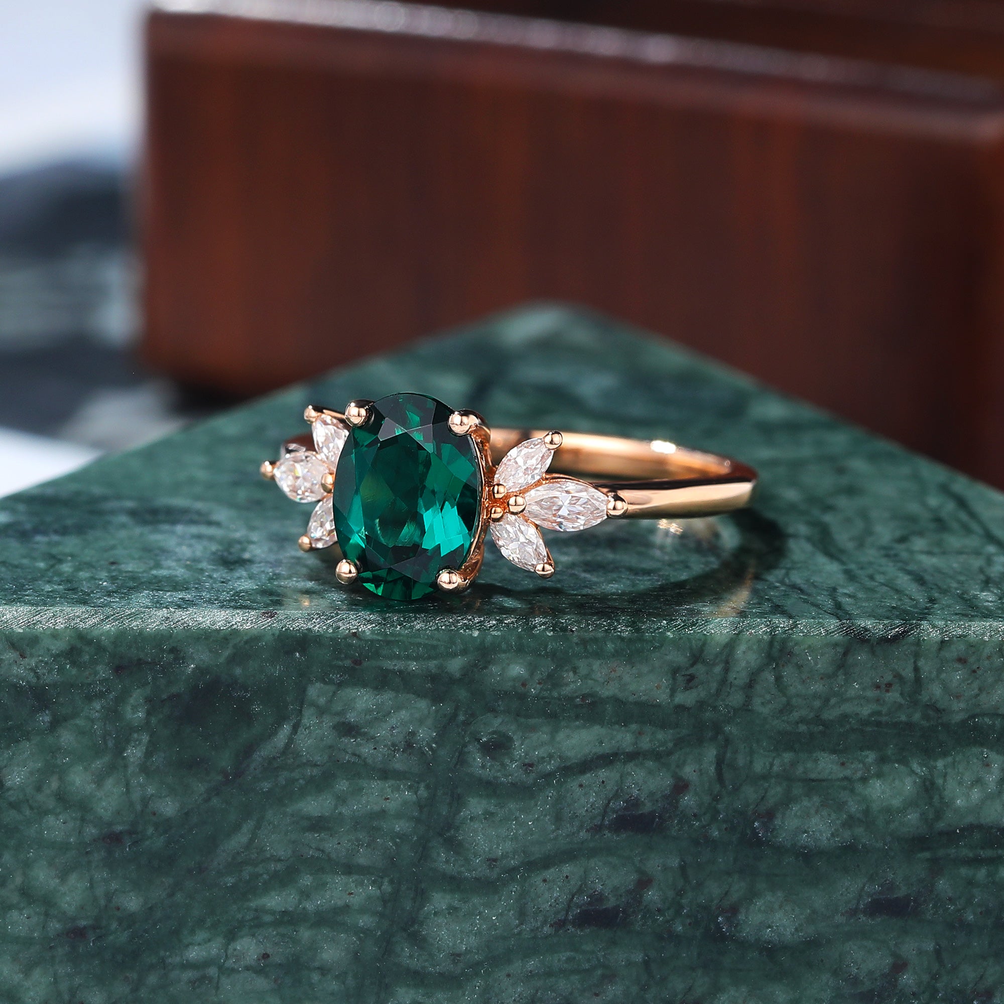 Oval cut Lab Emerald rose gold engagement Ring.