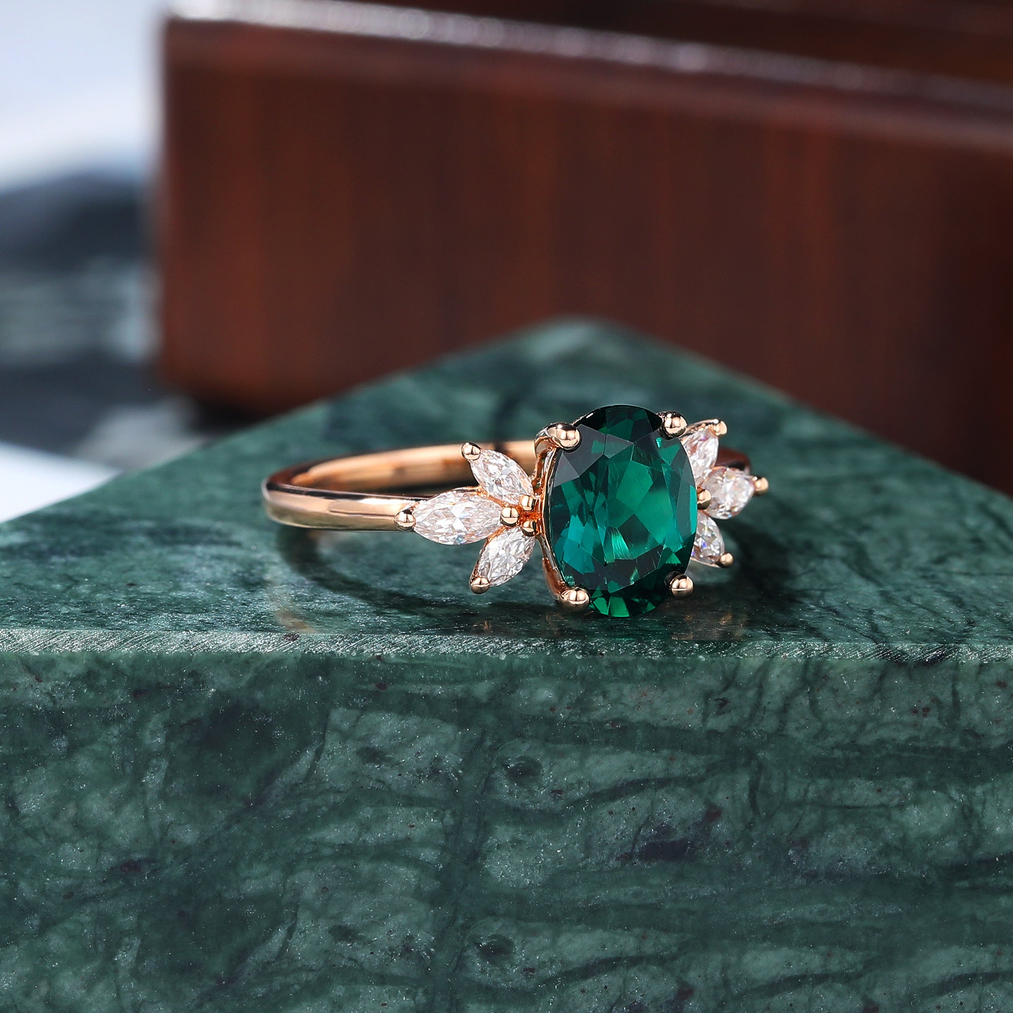 Oval cut Lab Emerald rose gold engagement Ring.