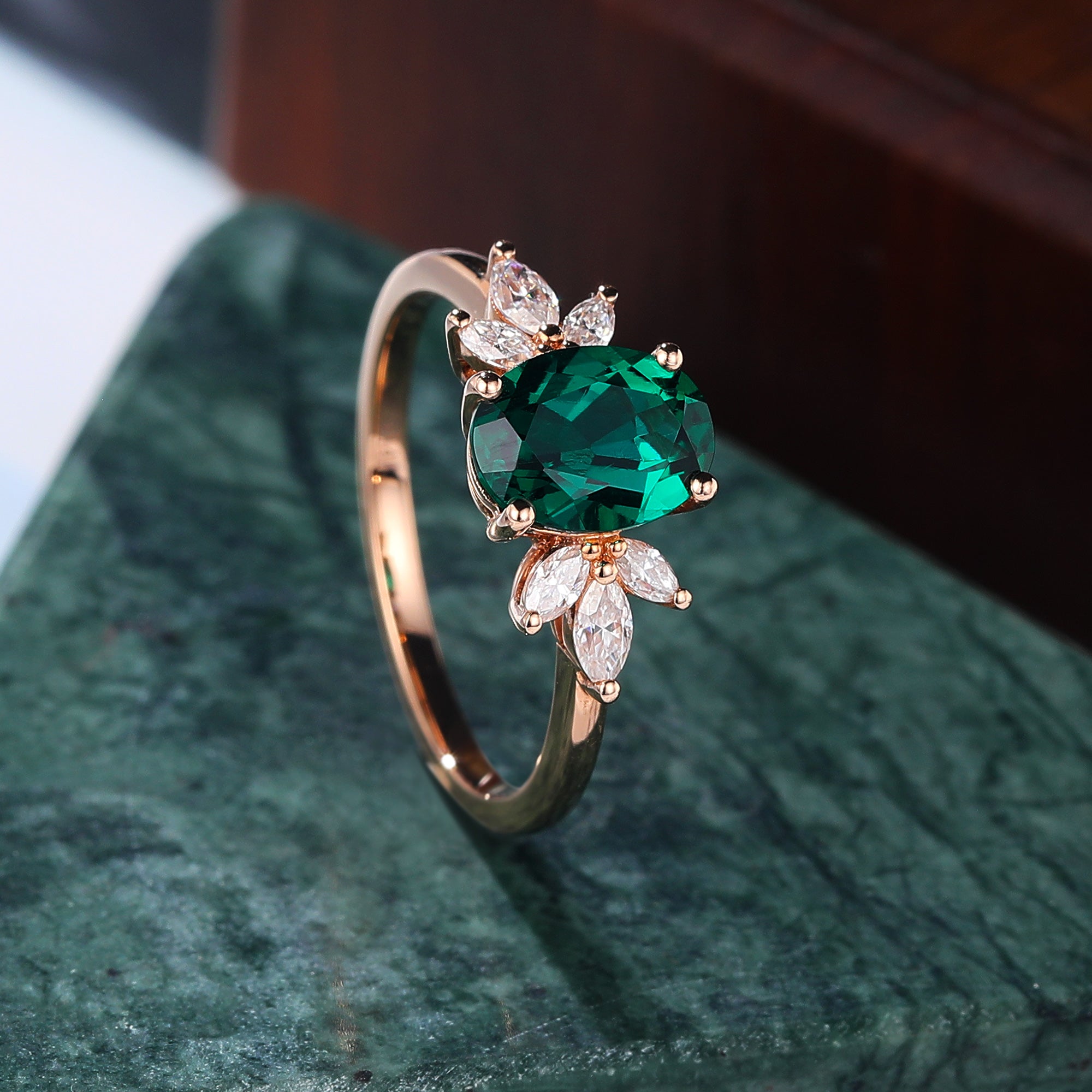 Oval cut Lab Emerald rose gold engagement Ring.