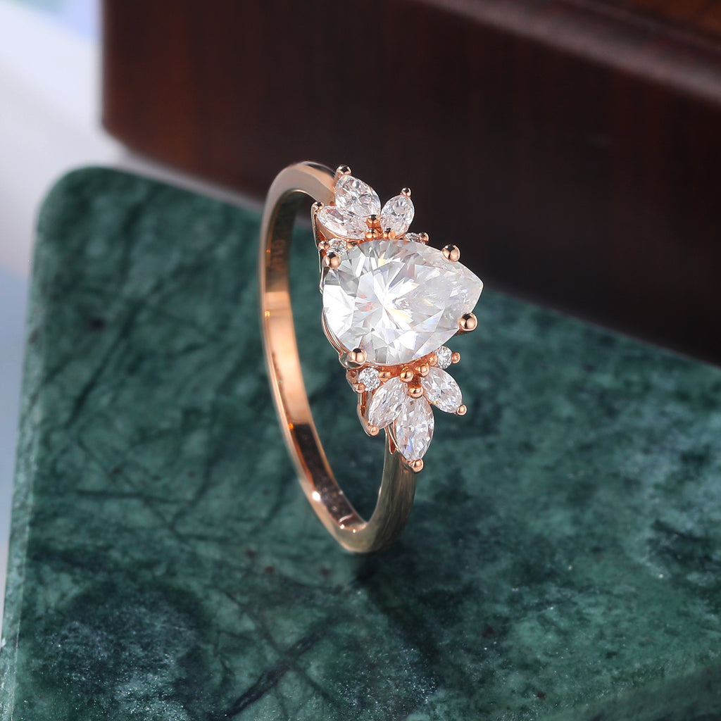 Pear shape  moissanite rose gold engagement Ring.