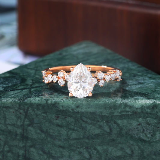 Pear shape  moissanite rose gold engagement Ring.