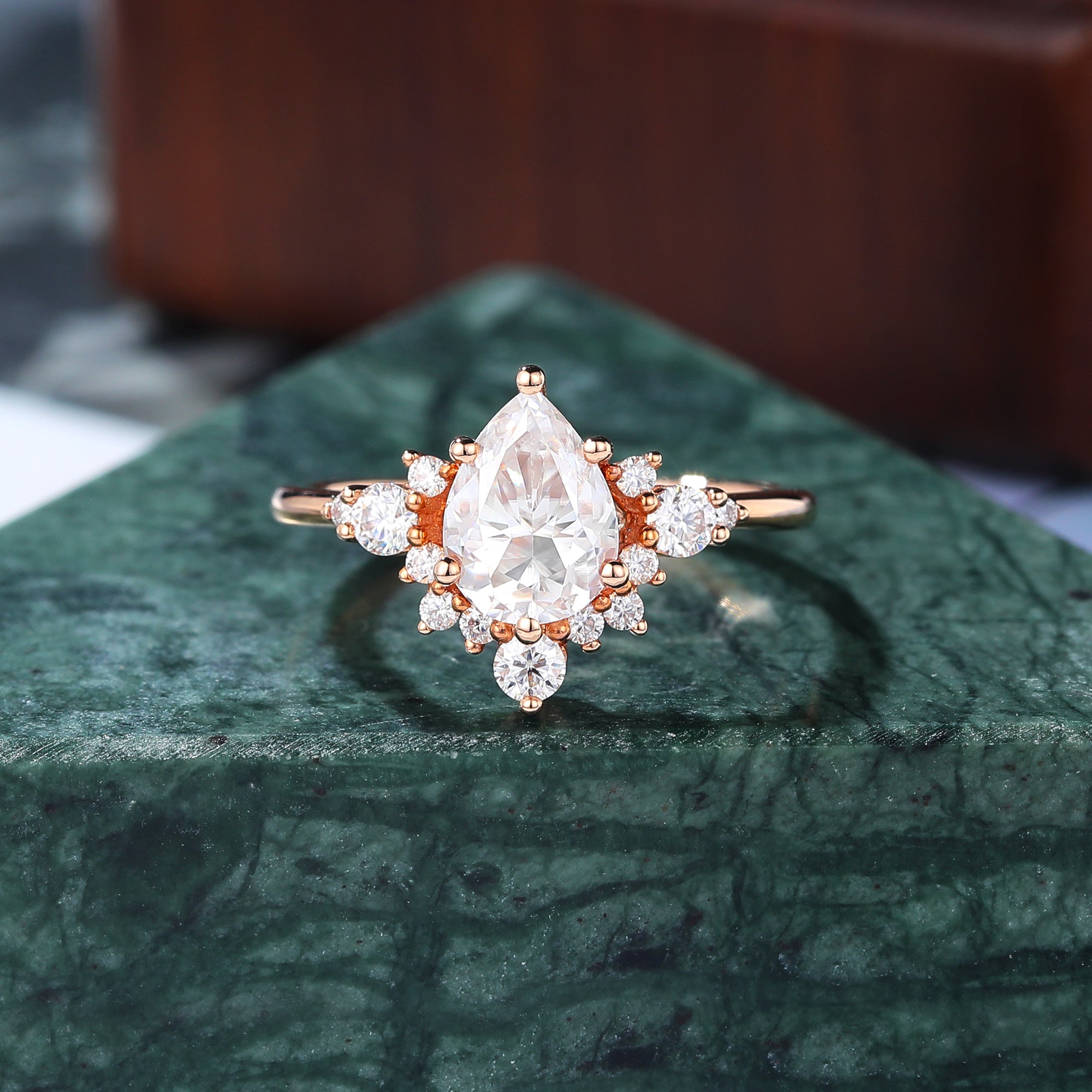 Pear shape moissanite rose gold engagement Ring.