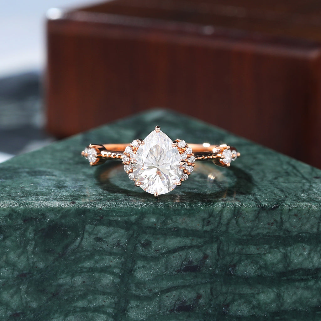 Pear shape moissanite rose gold engagement Ring.