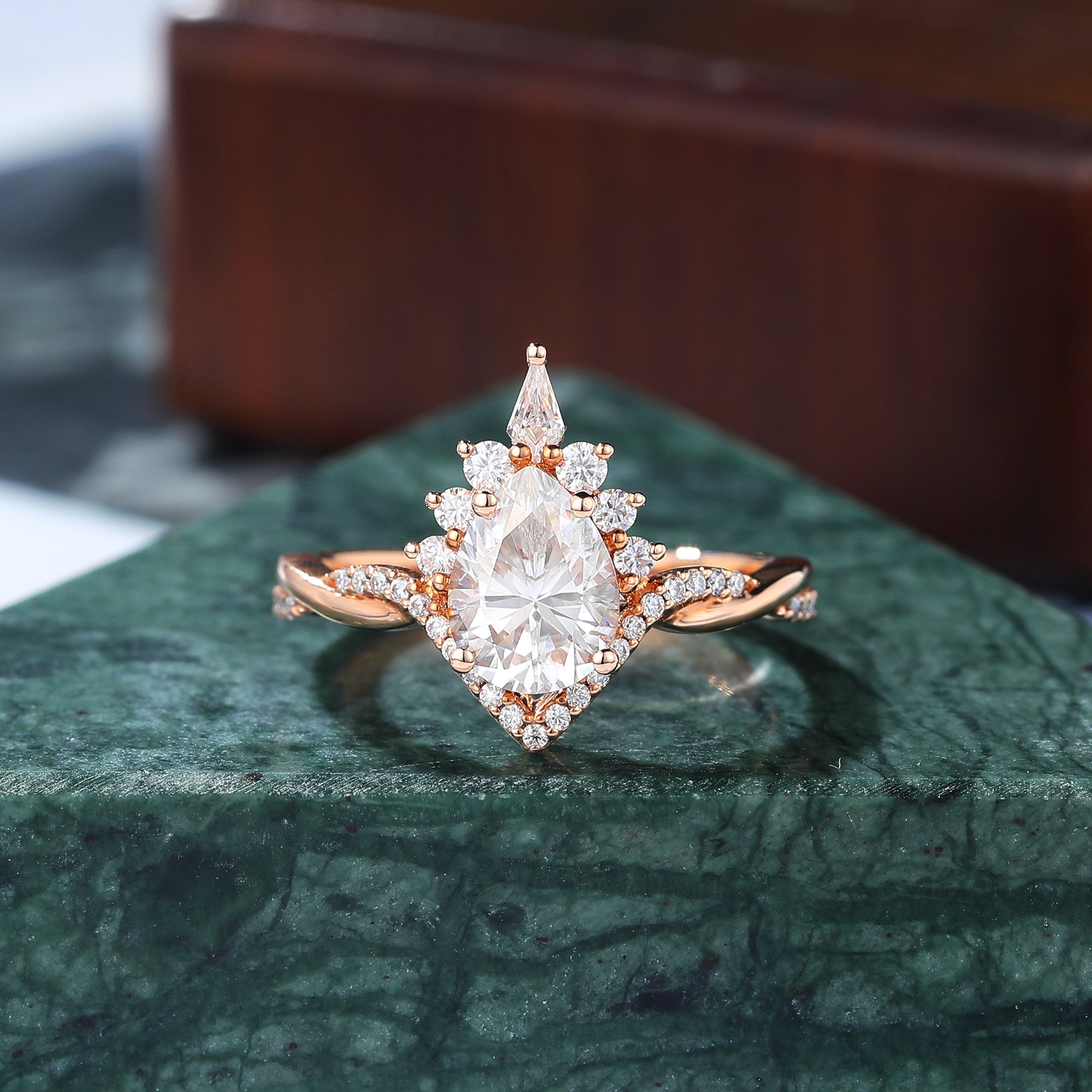 Pear shape moissanite rose gold engagement Ring.