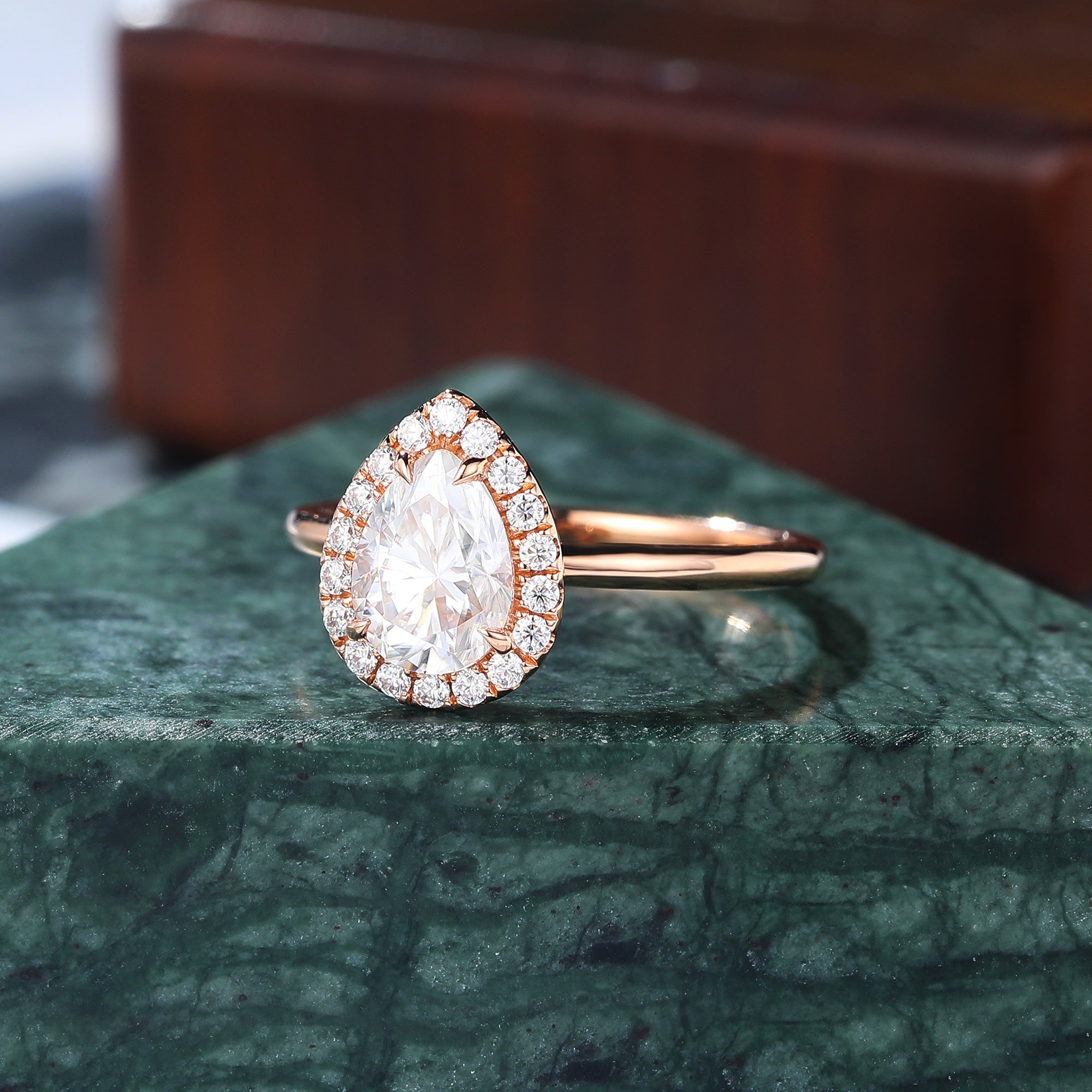 Pear shape Moissanite rose gold engagement Ring.