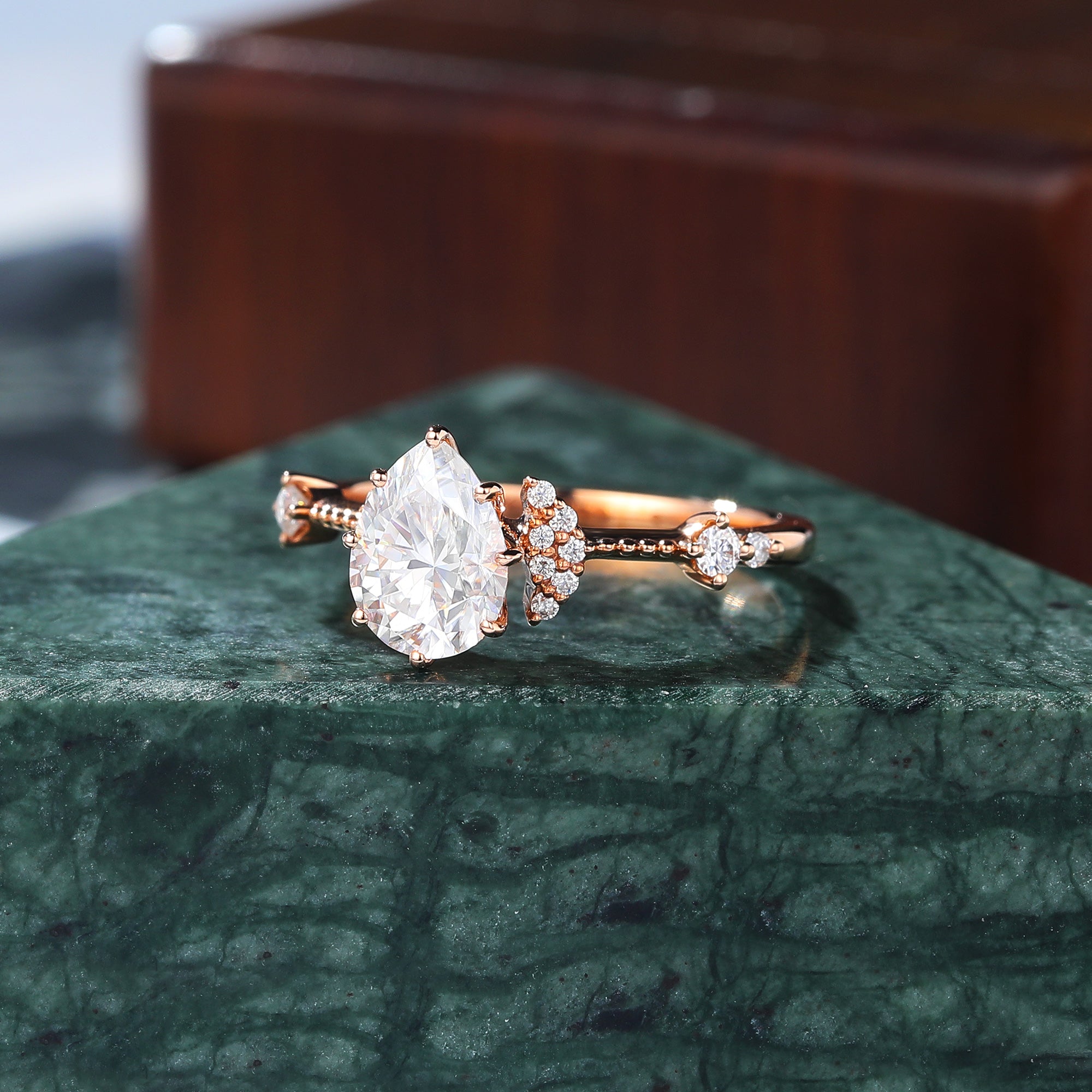Pear shape moissanite rose gold engagement Ring.