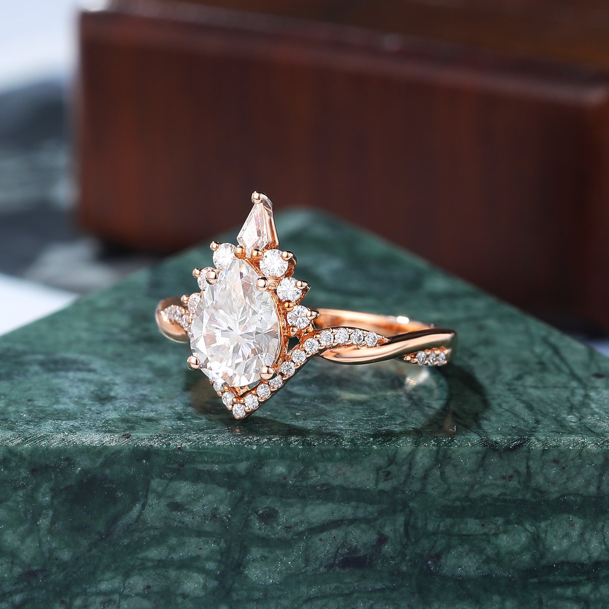 Pear shape moissanite rose gold engagement Ring.