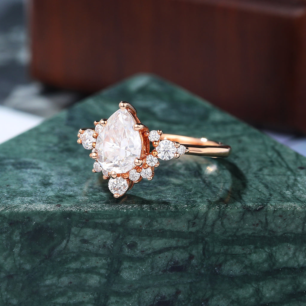 Pear shape moissanite rose gold engagement Ring.