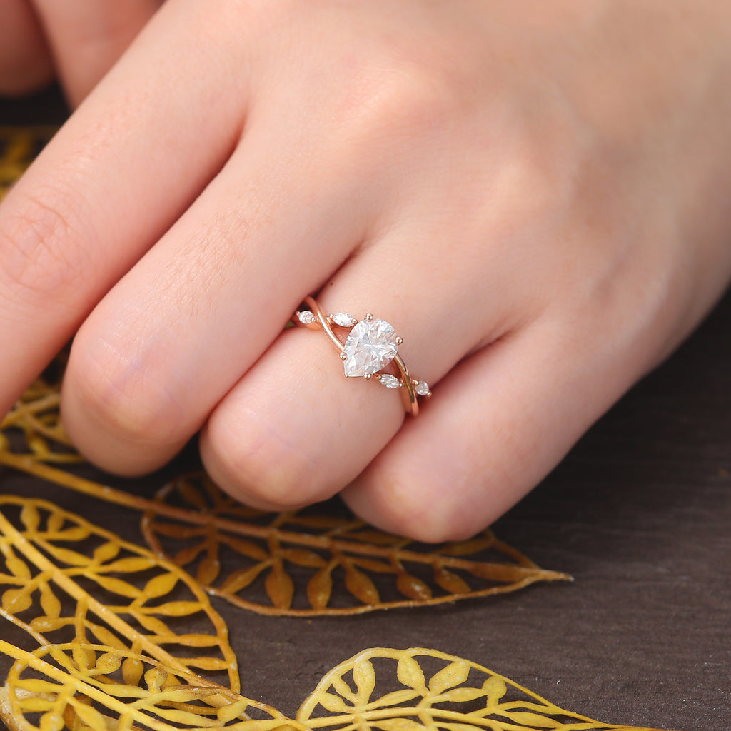 Pear shape  moissanite rose gold engagement Ring.
