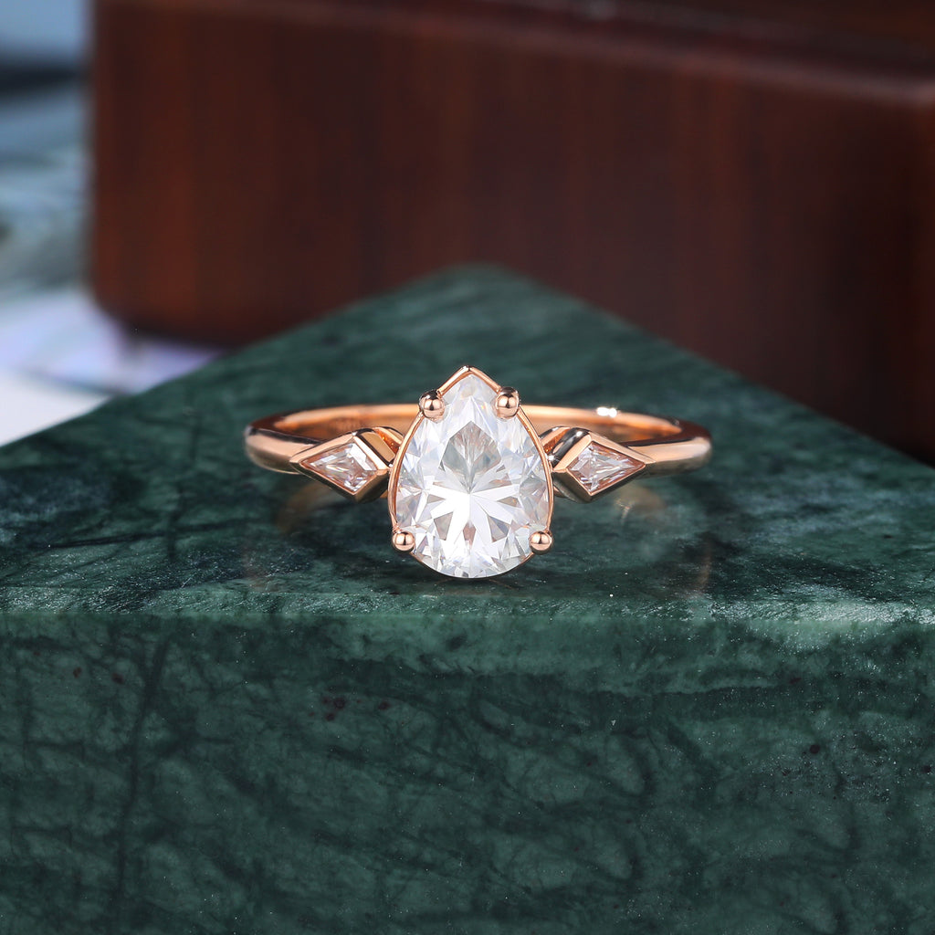 Pear shape  moissanite rose gold engagement Ring.