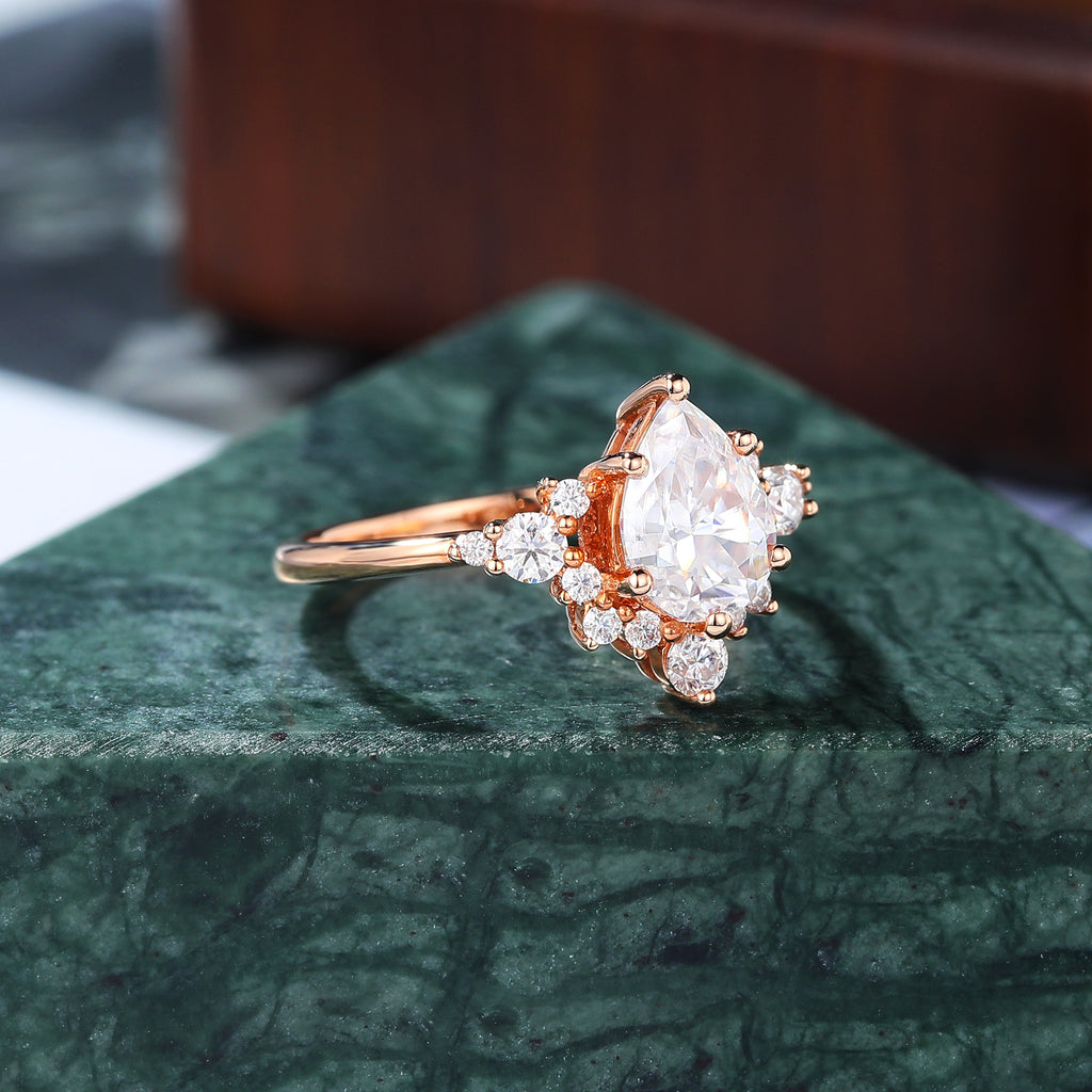 Pear shape moissanite rose gold engagement Ring.
