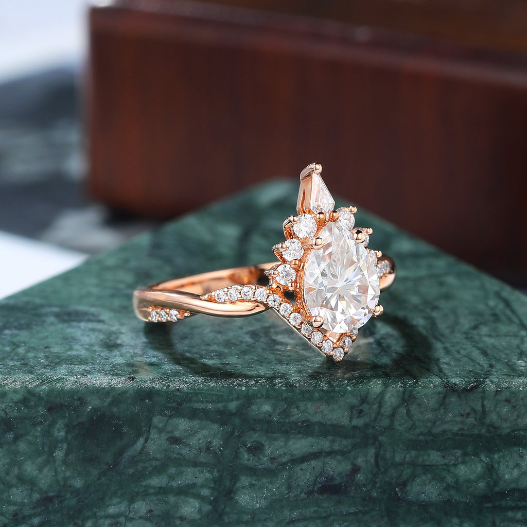 Pear shape moissanite rose gold engagement Ring.