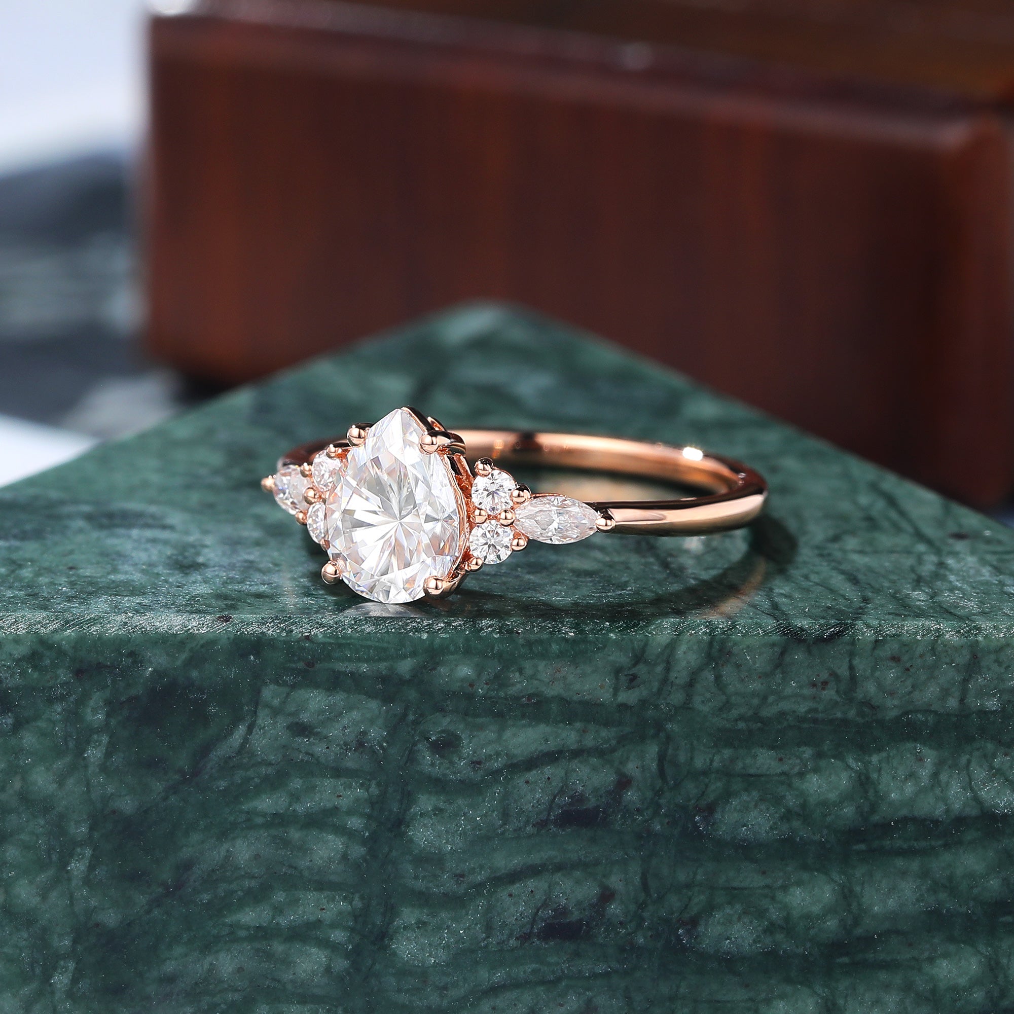 Pear shape moissanite rose gold engagement Ring.