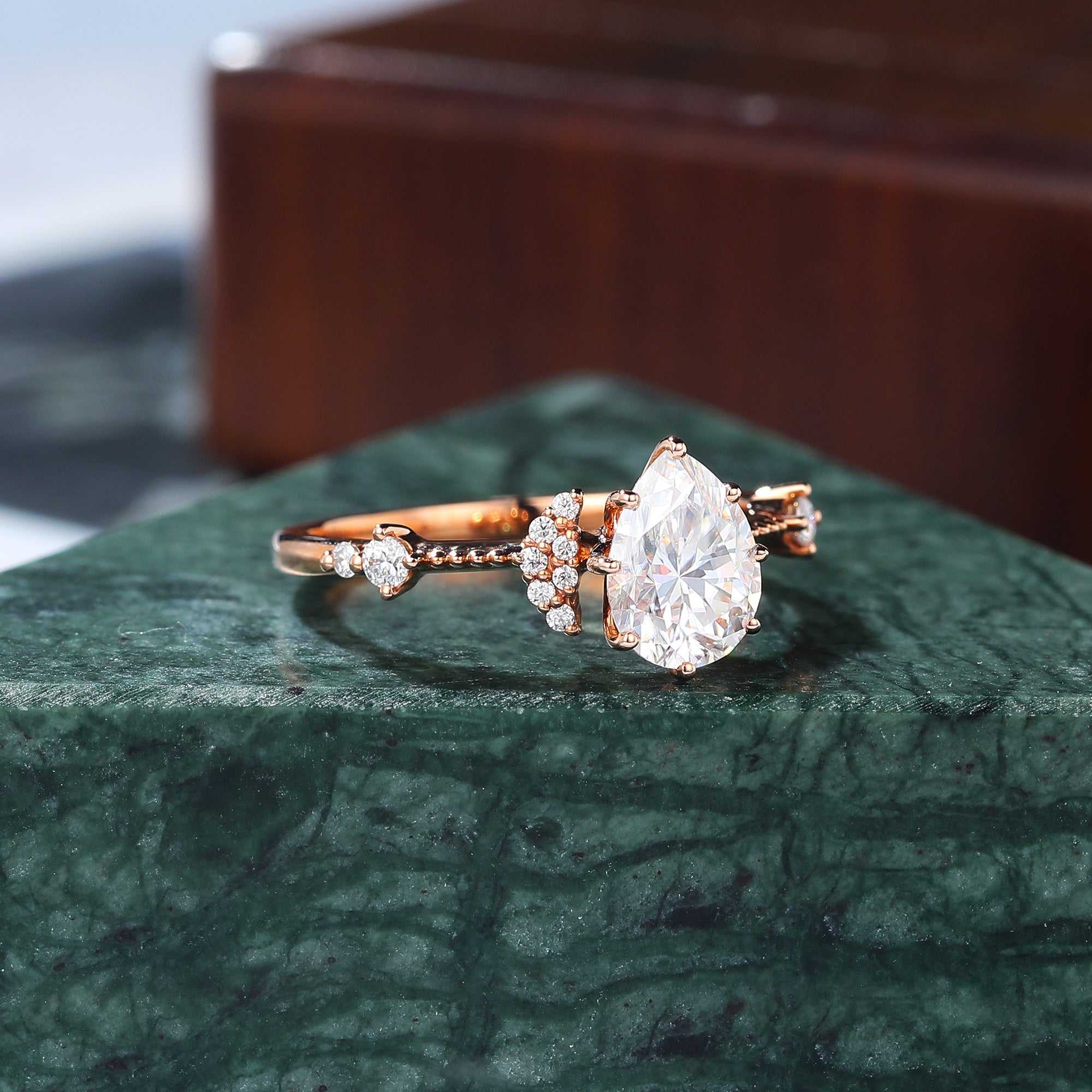 Pear shape moissanite rose gold engagement Ring.