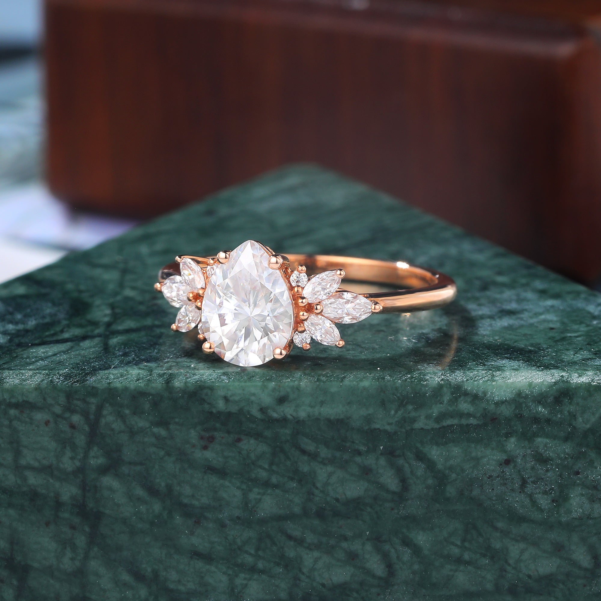 Pear shape  moissanite rose gold engagement Ring.