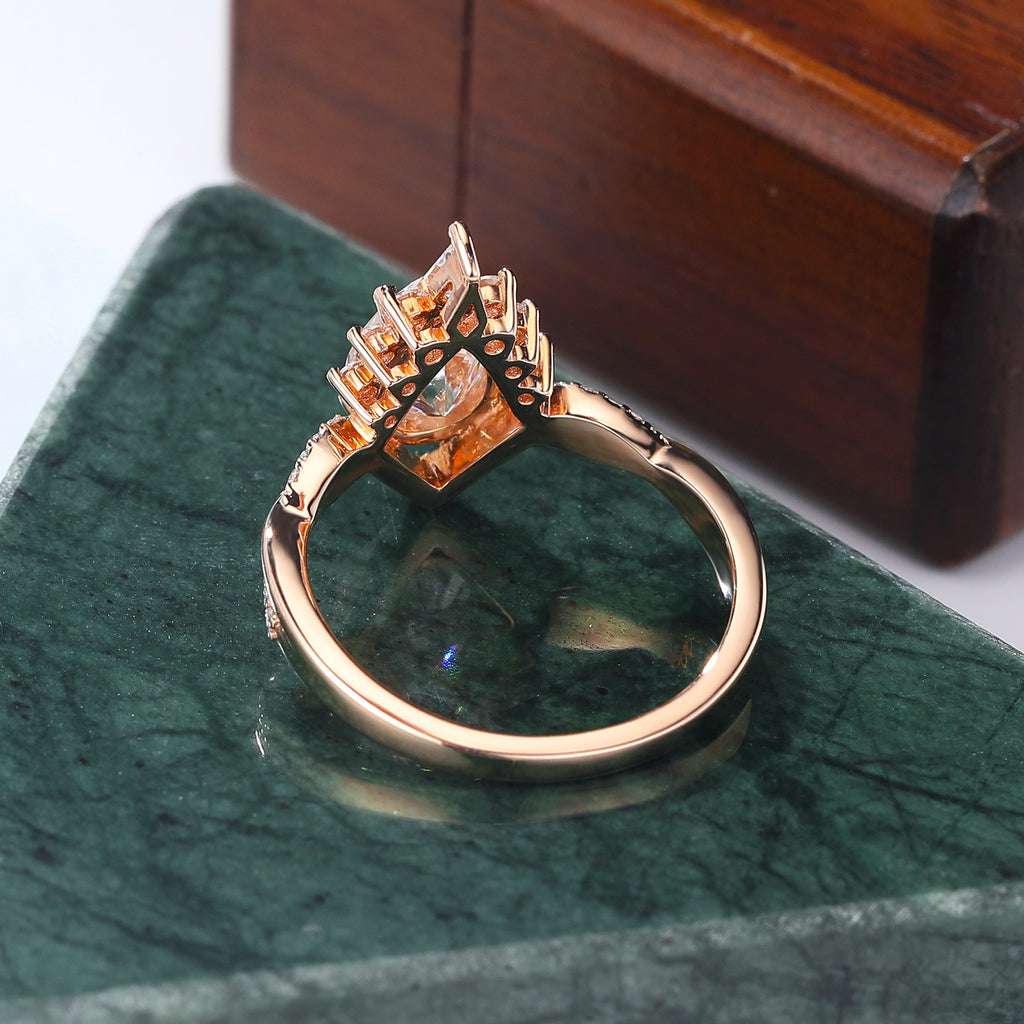 Pear shape moissanite rose gold engagement Ring.