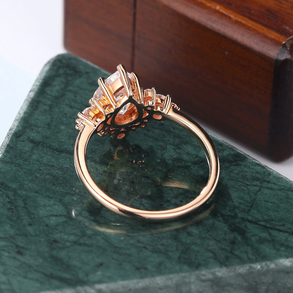Pear shape moissanite rose gold engagement Ring.