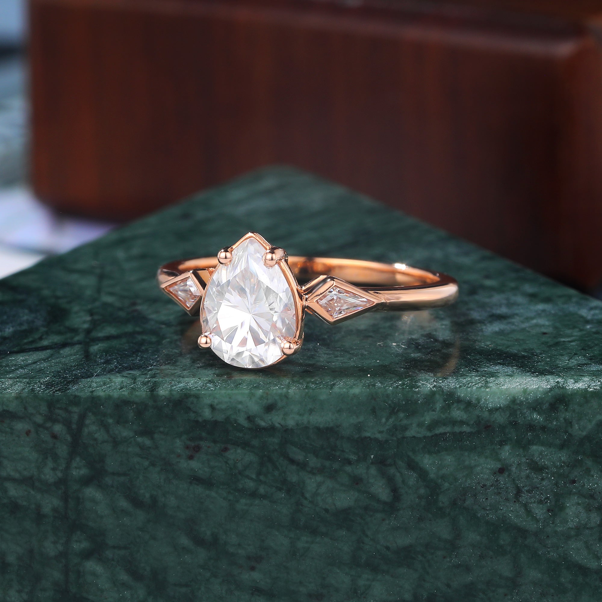 Pear shape  moissanite rose gold engagement Ring.