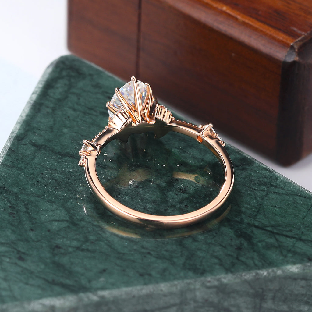 Pear shape moissanite rose gold engagement Ring.