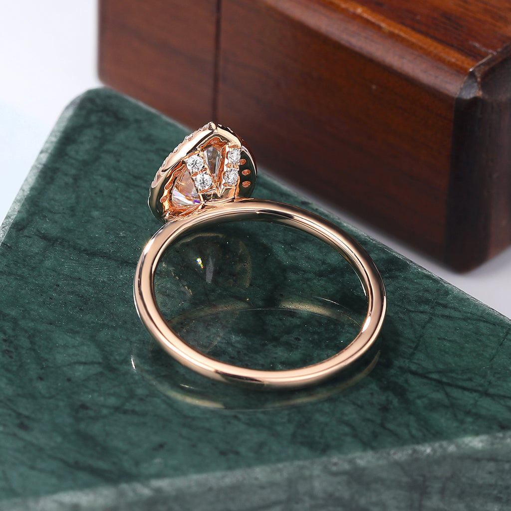 Pear shape Moissanite rose gold engagement Ring.