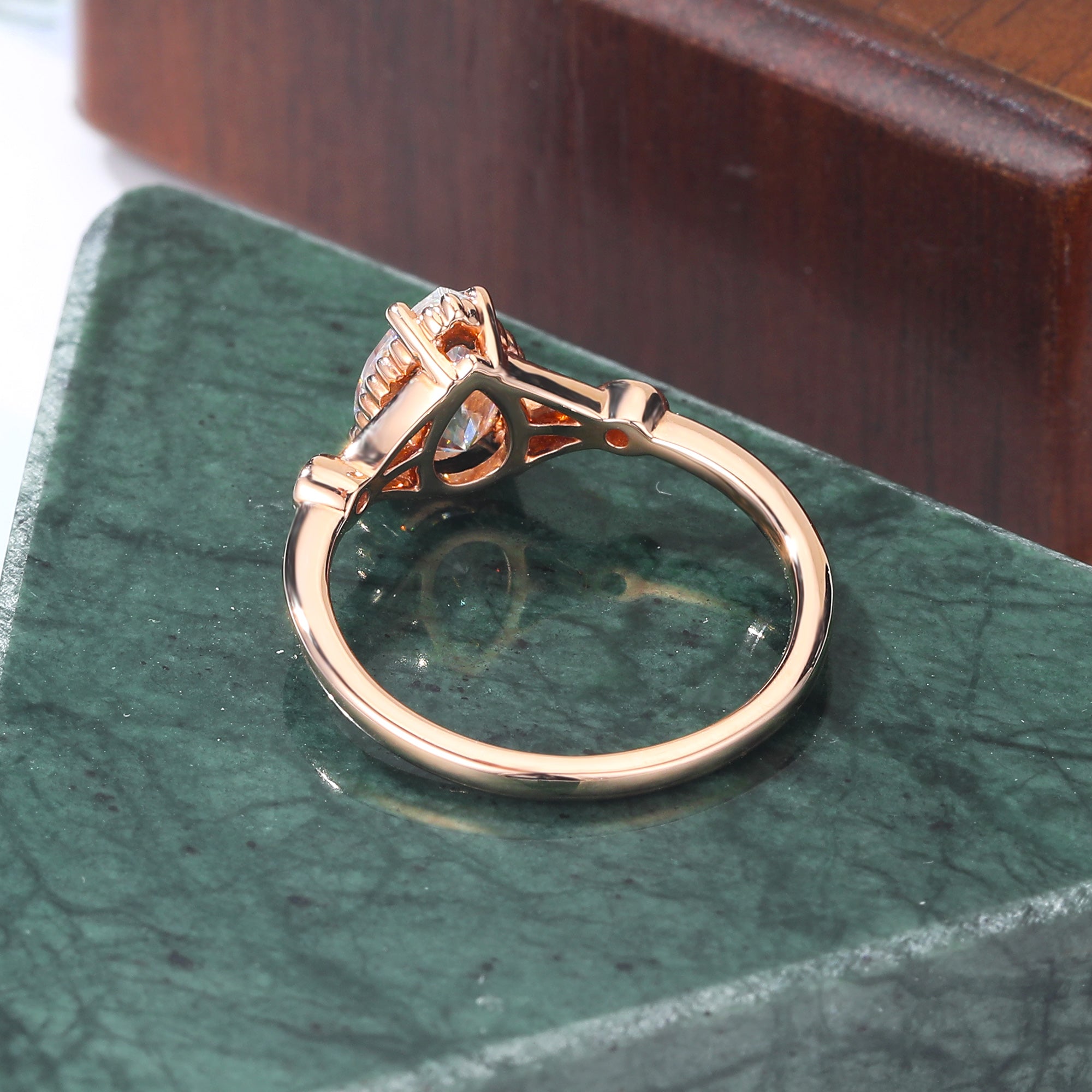 Pear shape  moissanite rose gold engagement Ring.