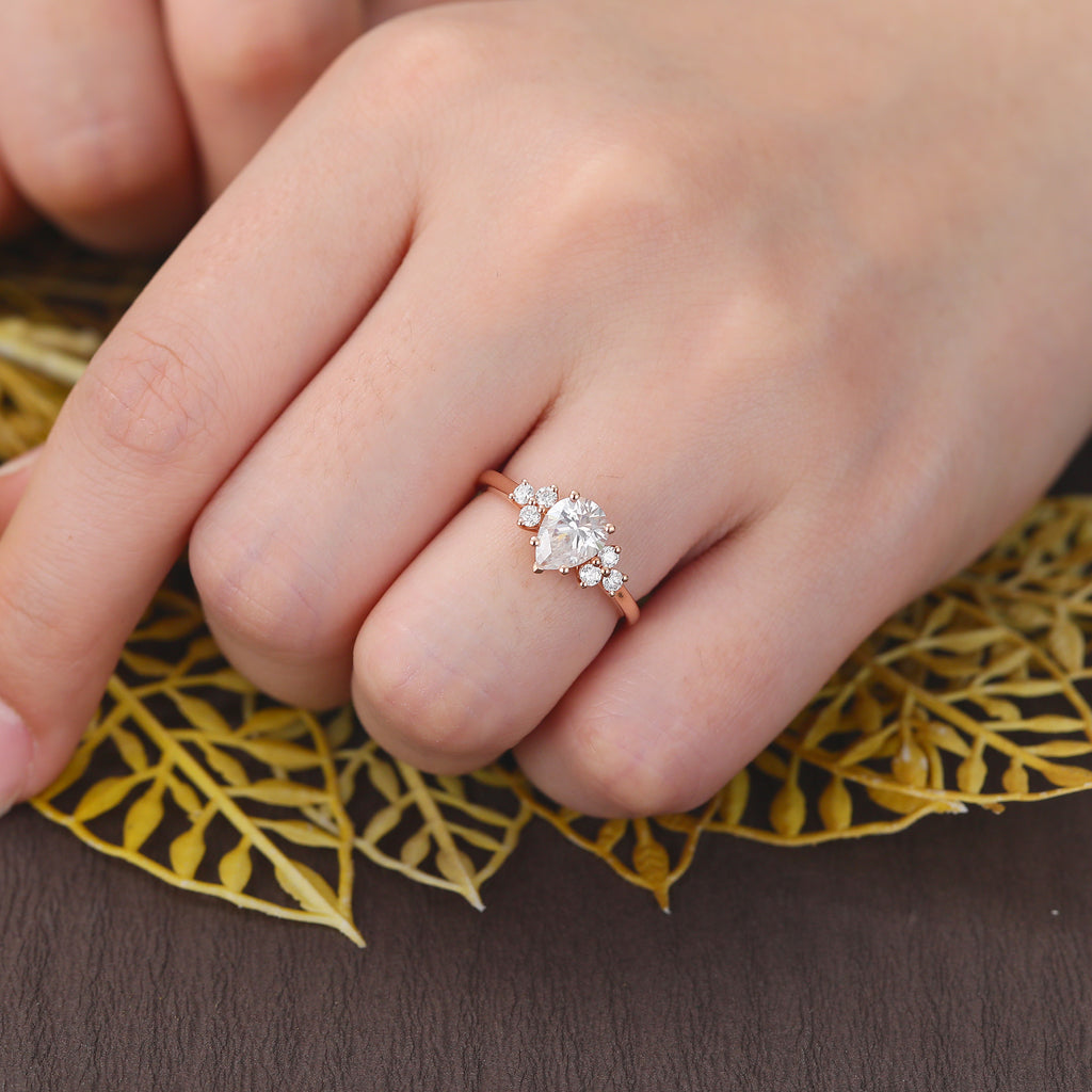 Pear shape moissanite rose gold engagement Ring.