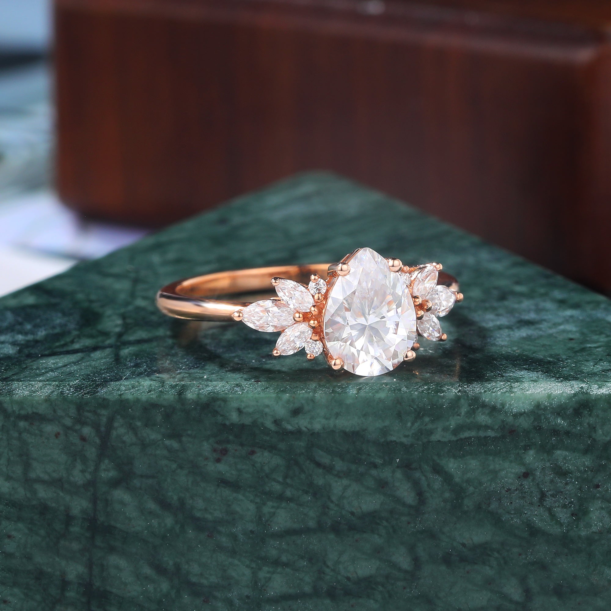 Pear shape  moissanite rose gold engagement Ring.