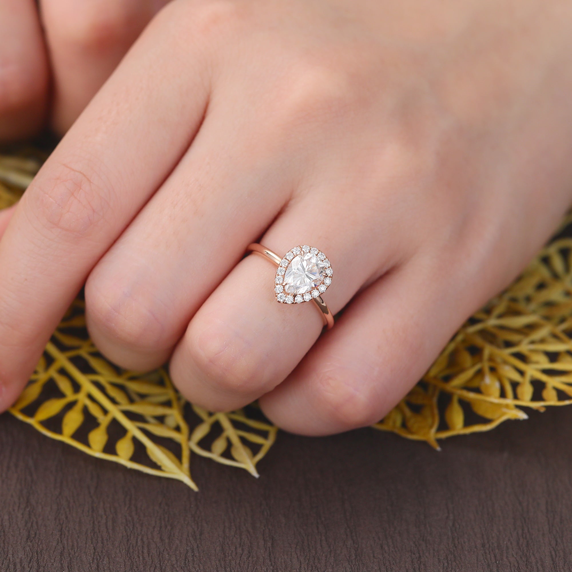 Pear shape Moissanite rose gold engagement Ring.