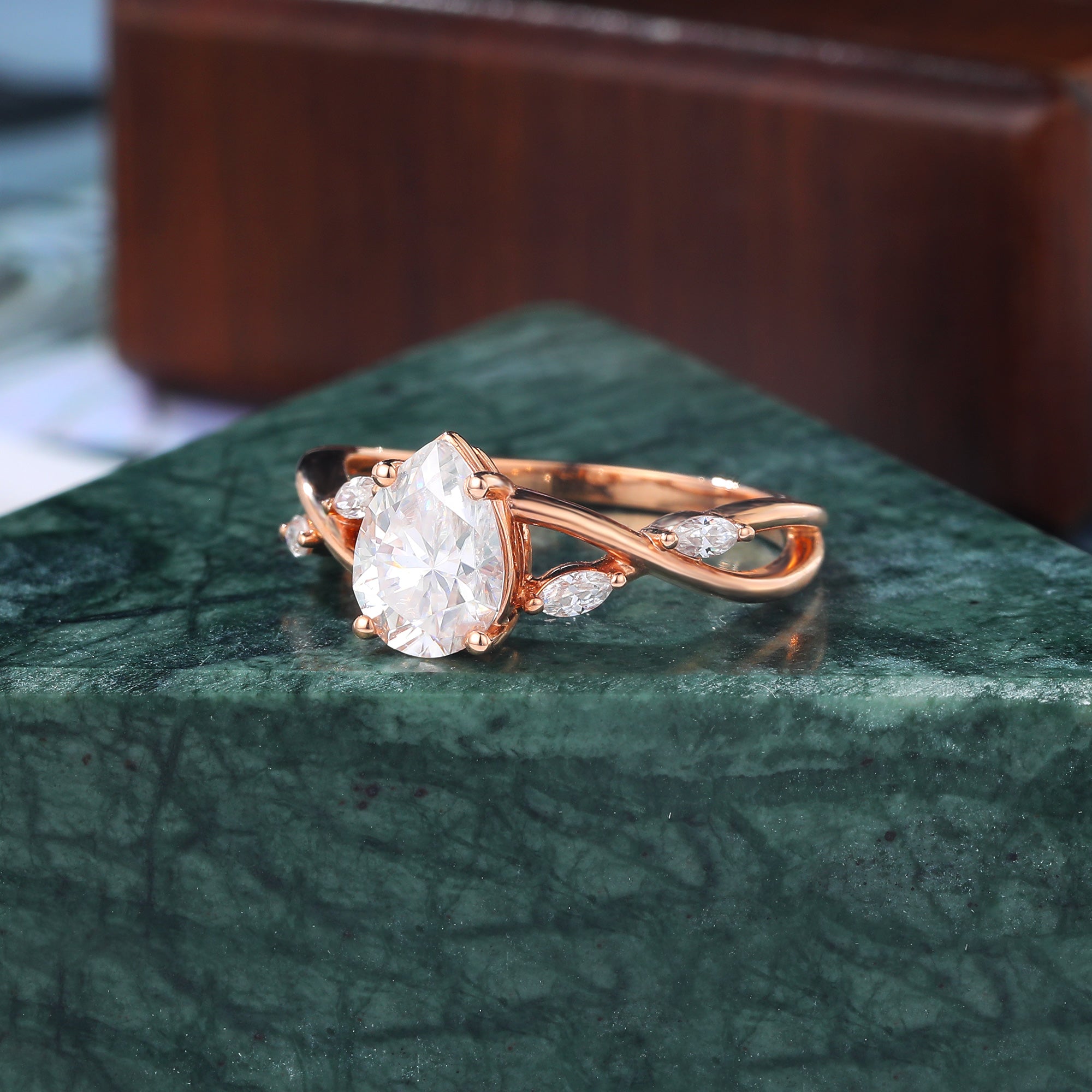 Pear shape  moissanite rose gold engagement Ring.
