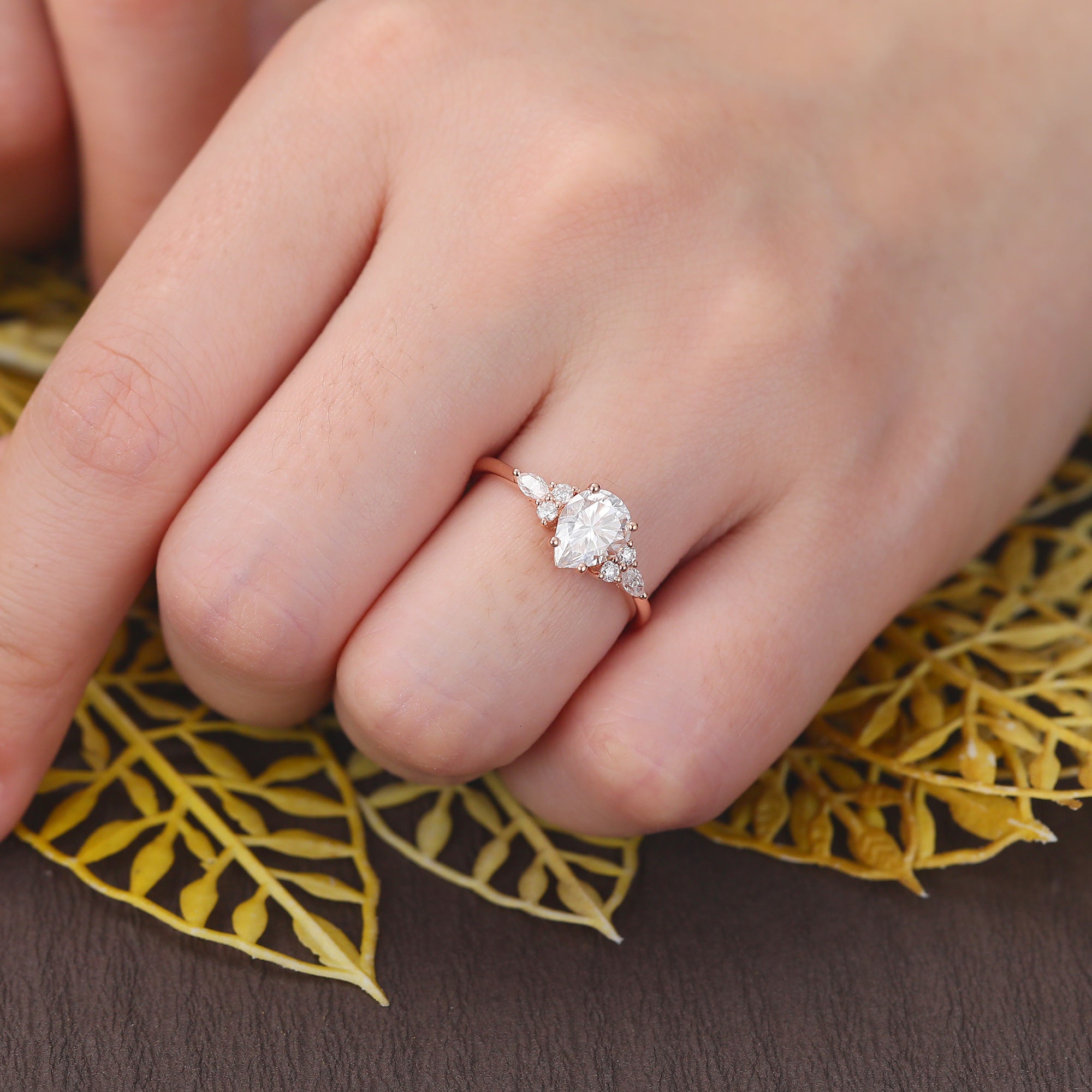 Pear shape moissanite rose gold engagement Ring.